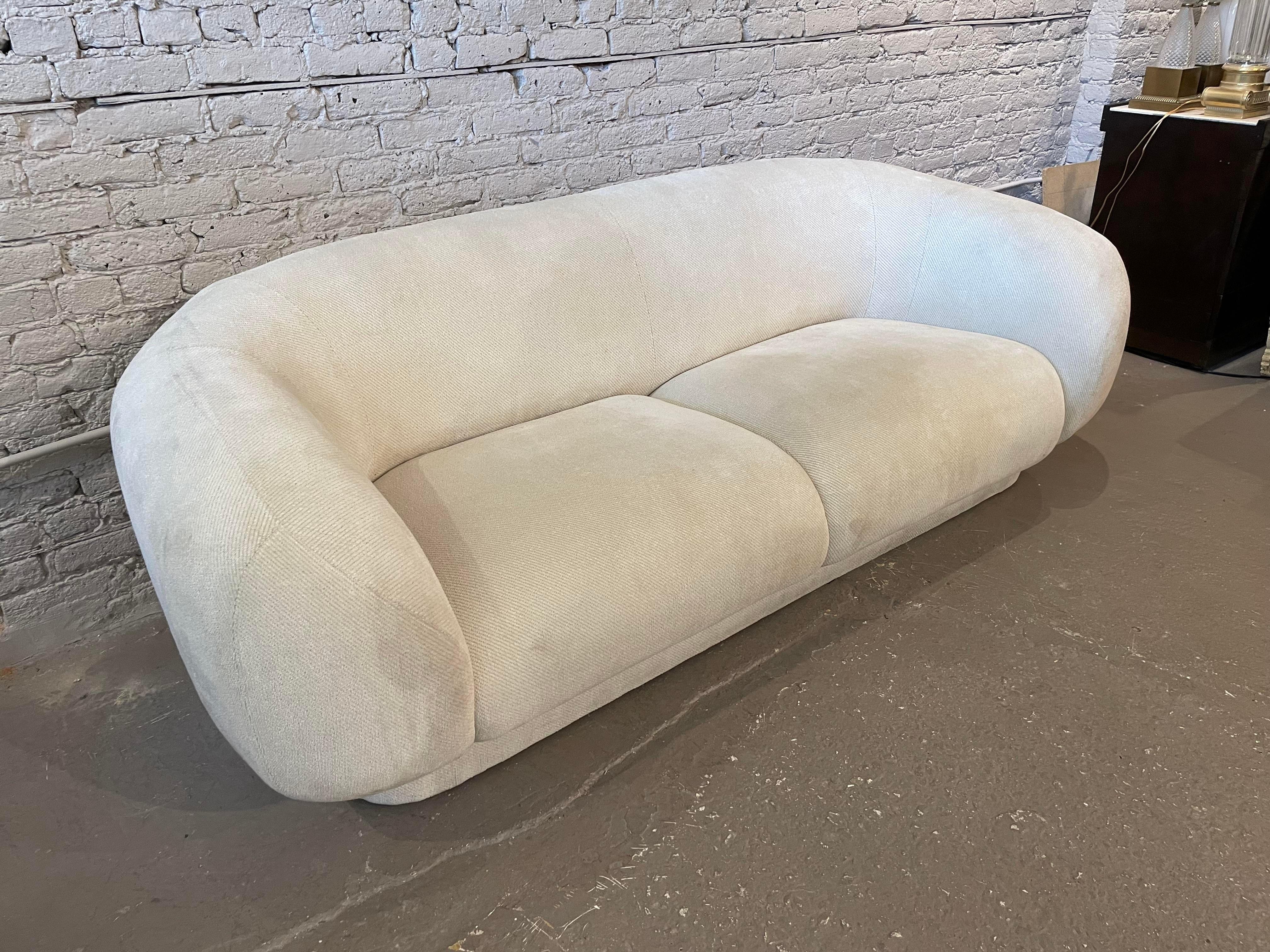Love this shape. In excellent condition but I recommend a deep cleaning or new upholstery. The cushions are still nice and firm.
I think this was made by Directional based on the design and quality but it’s not labeled.