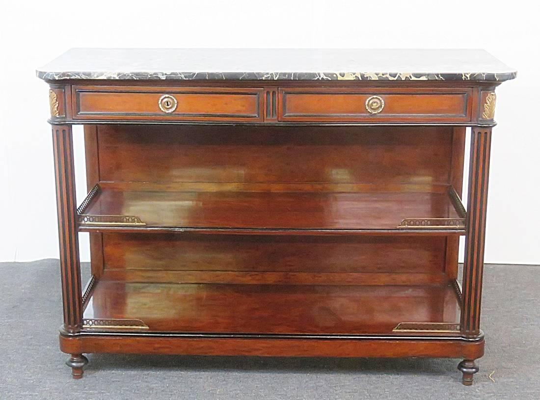 Louis XVI server with a marble top, brass mounts and two drawers.