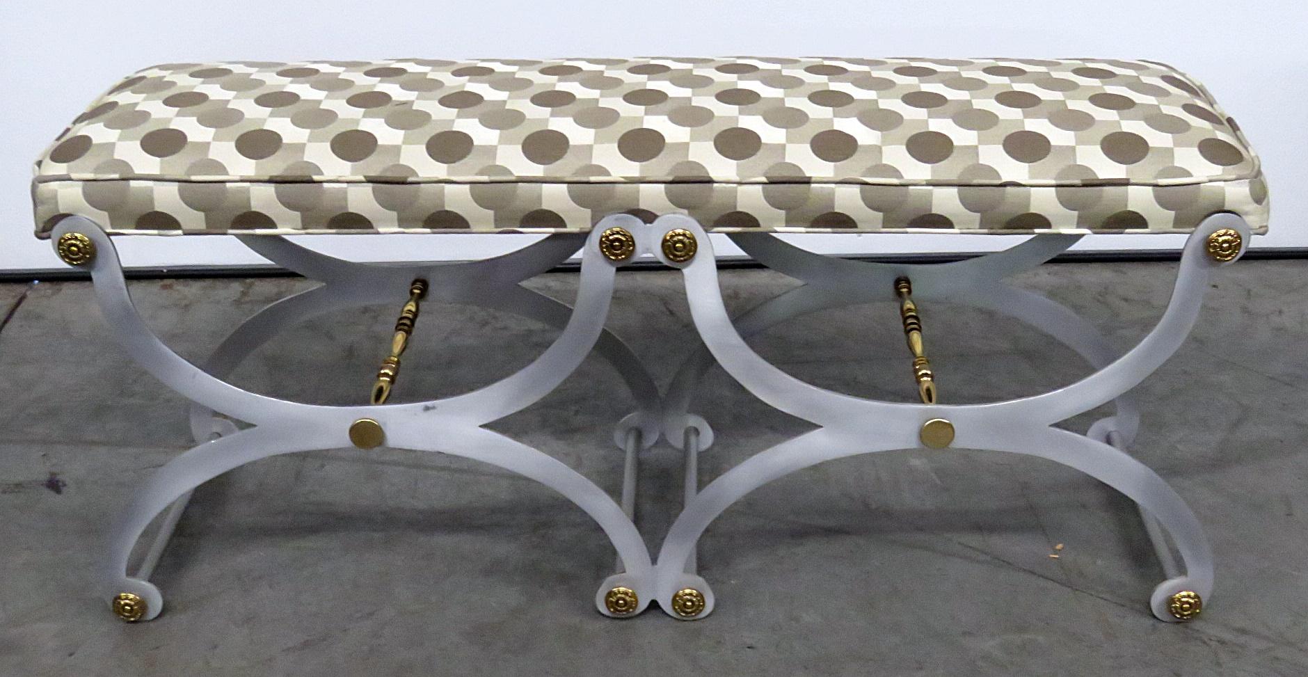 Directoire style bench with brass accents and Mid-Century Modern style upholstery. Most likely made by Maison Jansen but not marked. This is a special and unique piece that is very unique and rare. 