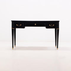 Directoire style ebonized mahogany leather top desk C 1950.