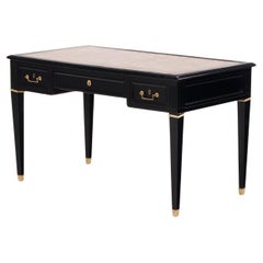 Directoire style ebonized mahogany leather top desk C 1950.