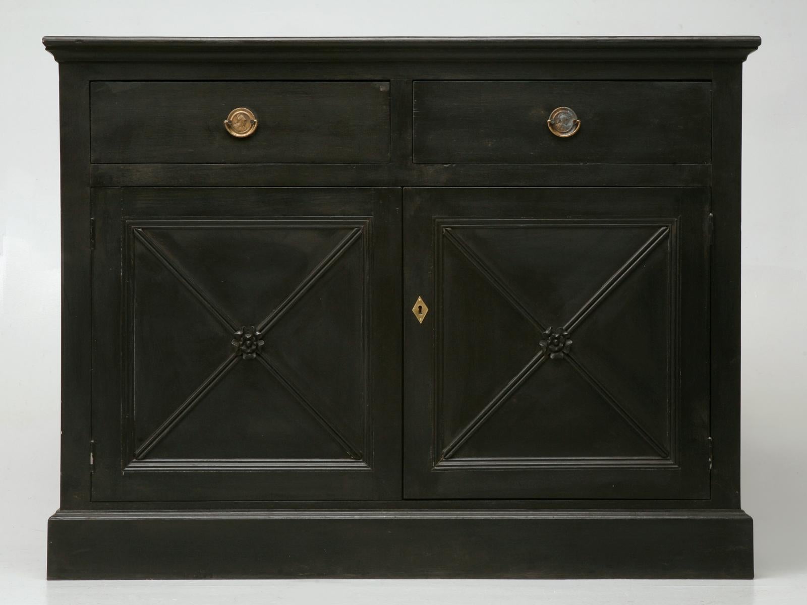 Handcrafted in our Old Plank woodworking department this two drawers over two doors black Directoire style buffet can be sized in any dimension or finish. Great scale, perfectly suited for an entry hall or dining room.