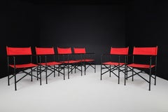 Director’s Folding Chair in lacquered steel frame, brass, red canvas seat 1980s