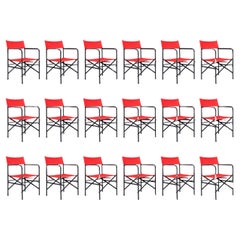 Director’s Folding Chair in lacquered steel frame, brass, red canvas seat 1980s