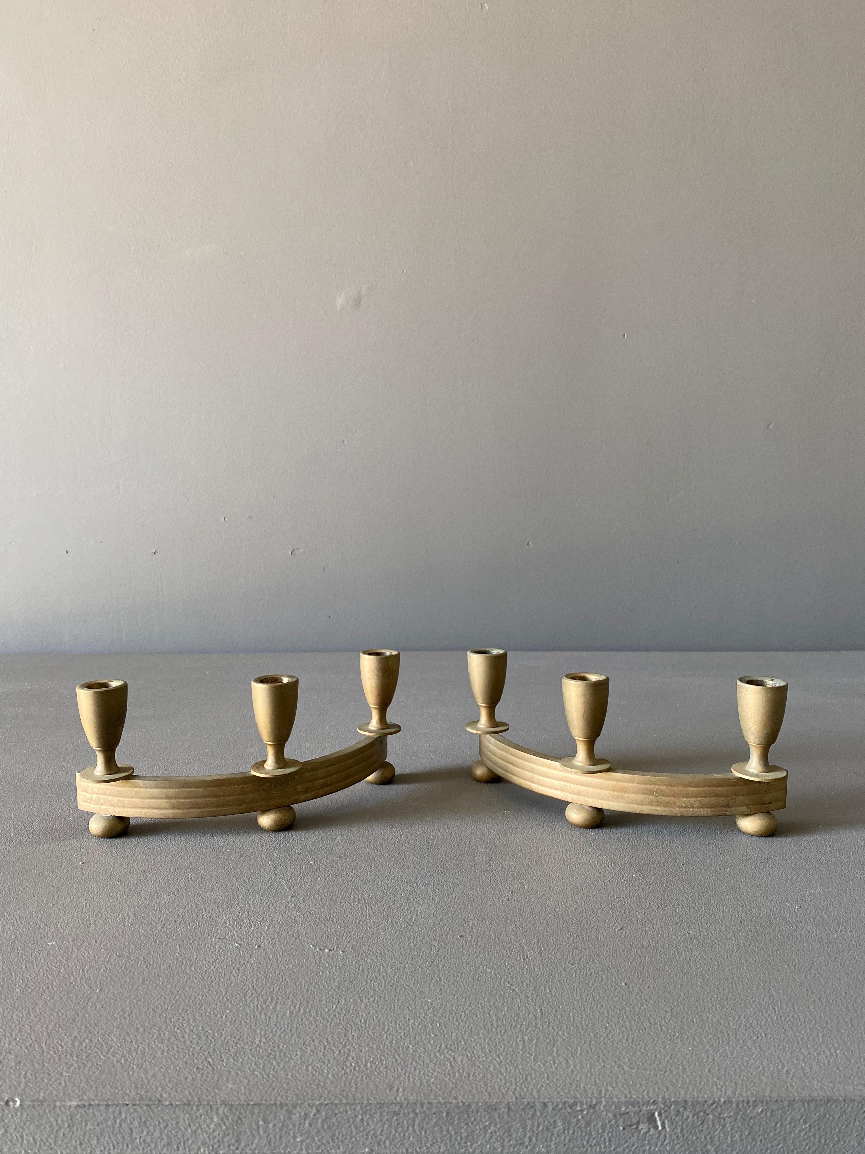 Dirilyte solid brass candle holders. circa 1955.