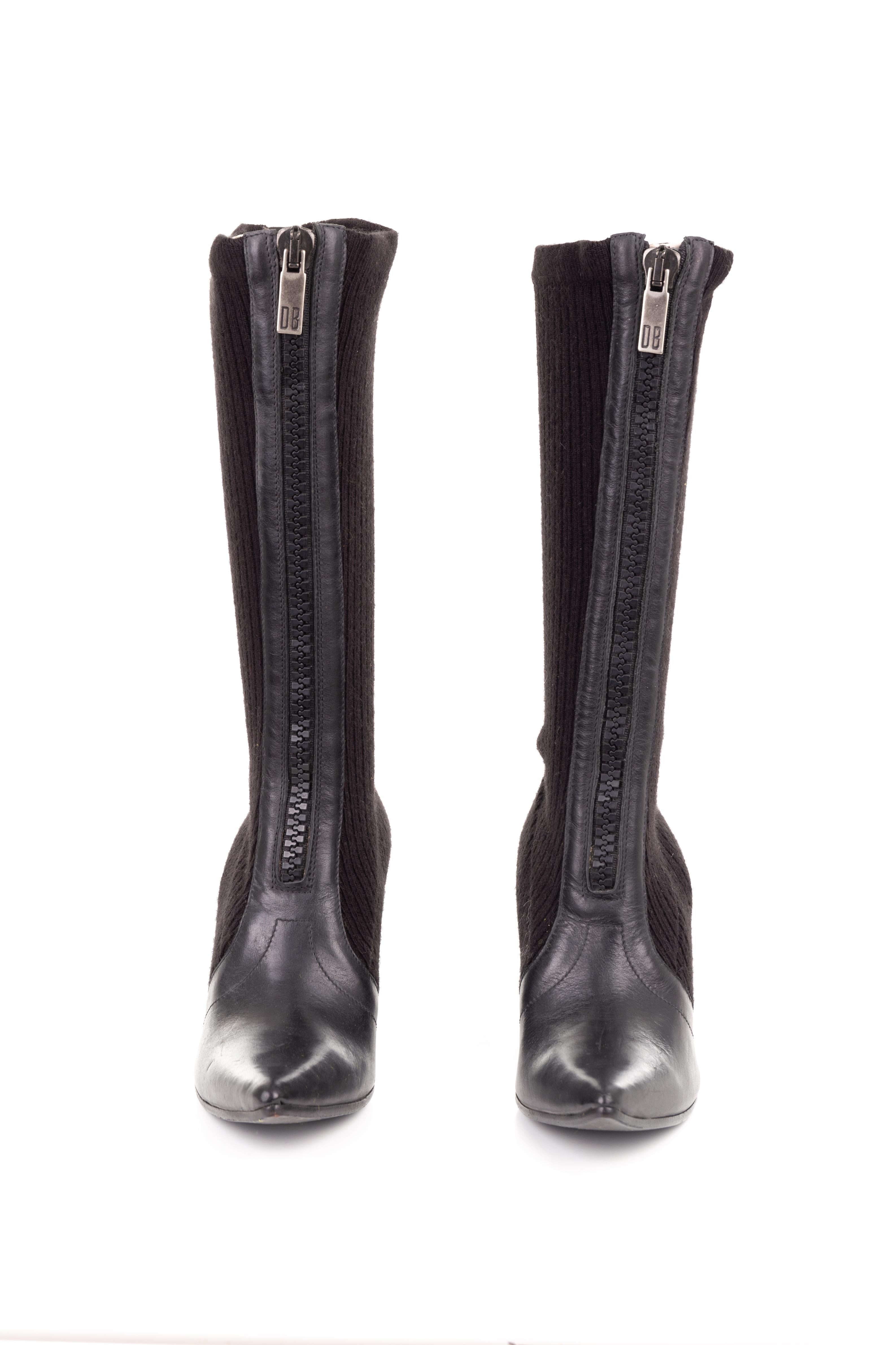 - Dirk Bikkembergs Fall Winter 2003 collection
- Sold by Gold Palms Vintage
- Black wool rib knit boots
- Leather point toe
- Wedge heel
- Front zipper fastening
- Size: 37 / US 6.5 / UK 4.5