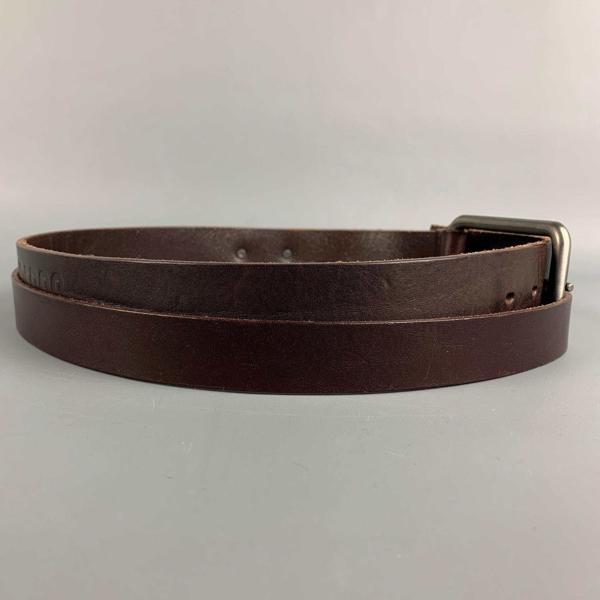 DIRK BIKKEMBERGS belt comes in a brown leather featuring a double buckle design. Made in Italy.
 Very Good
 Pre-Owned Condition. 
 

 Marked:  44/07Length: 47.5 inches Width: 1.5 inches Fits: 37 inches - 42 inches Buckle: 3 inches 
  
  
  
 Sui