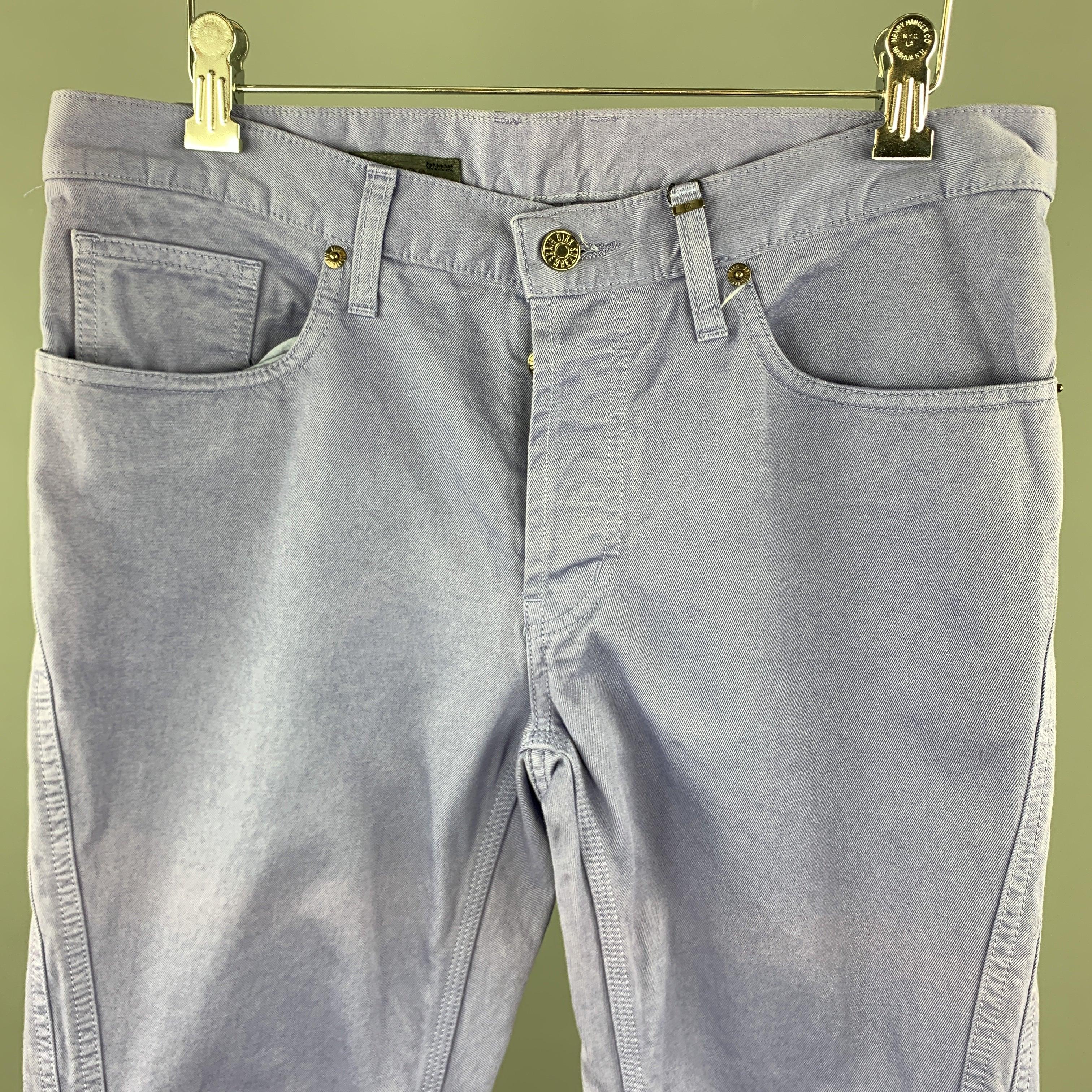 DIRK BIKKEMBERGS jeans come in light purple denim with a button fly double side seams, and silver tone back plaque. Made in Italy.New with Tags. 

Marked:   30 

Measurements: 
  Waist: 33 inches Rise:
9 inches Inseam: 28 inches 
  
  
 
Reference: