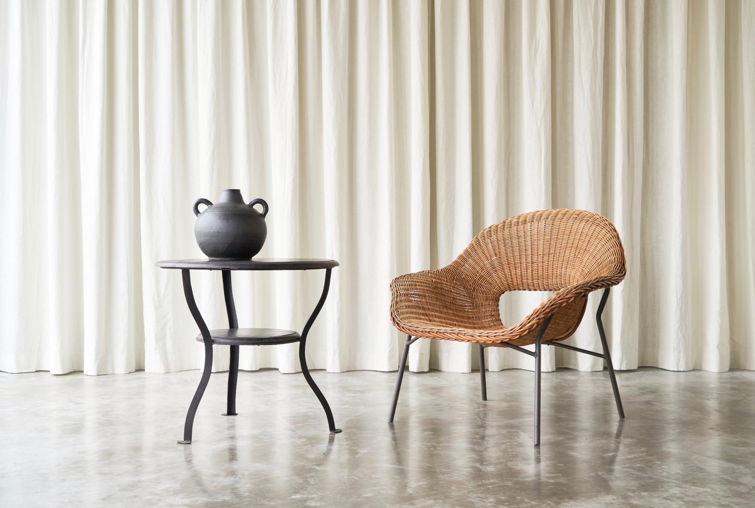 Dirk van Sliedregt Easy Chair in Rattan and Metal, The Netherlands, 1960s.

This rattan and metal lounge chair was designed in the 1960s by Dirk Van Sliedregt, for Dutch manufacterer Gebroeders Jonkers. It is a rare model, as it was only made in a
