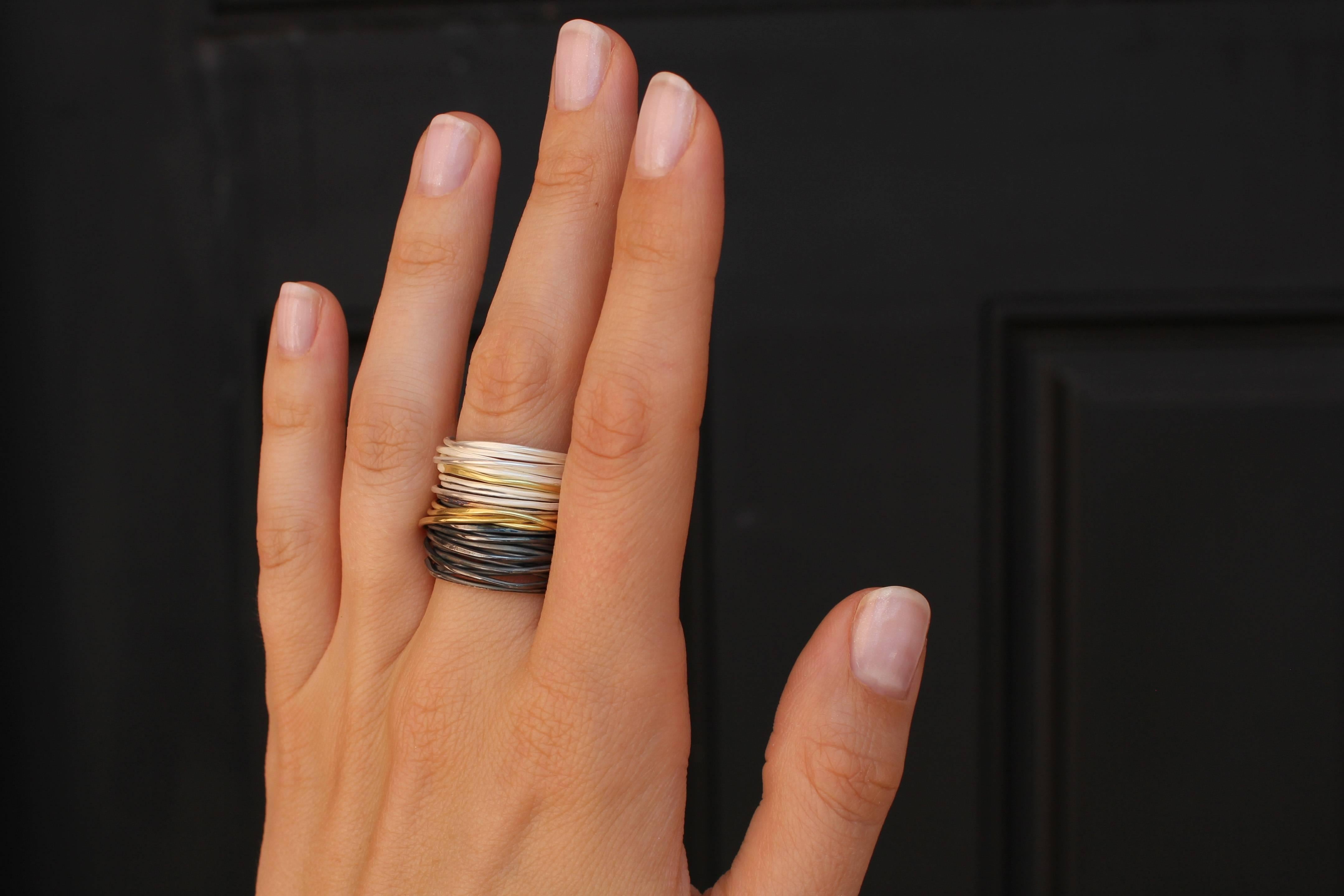 Triple Spaghetti Band Ring handcrafted by Disa Allsop with intertwined bright silver, oxidized silver, and 18k yellow gold strands. Size 8 (special order available in other sizes).