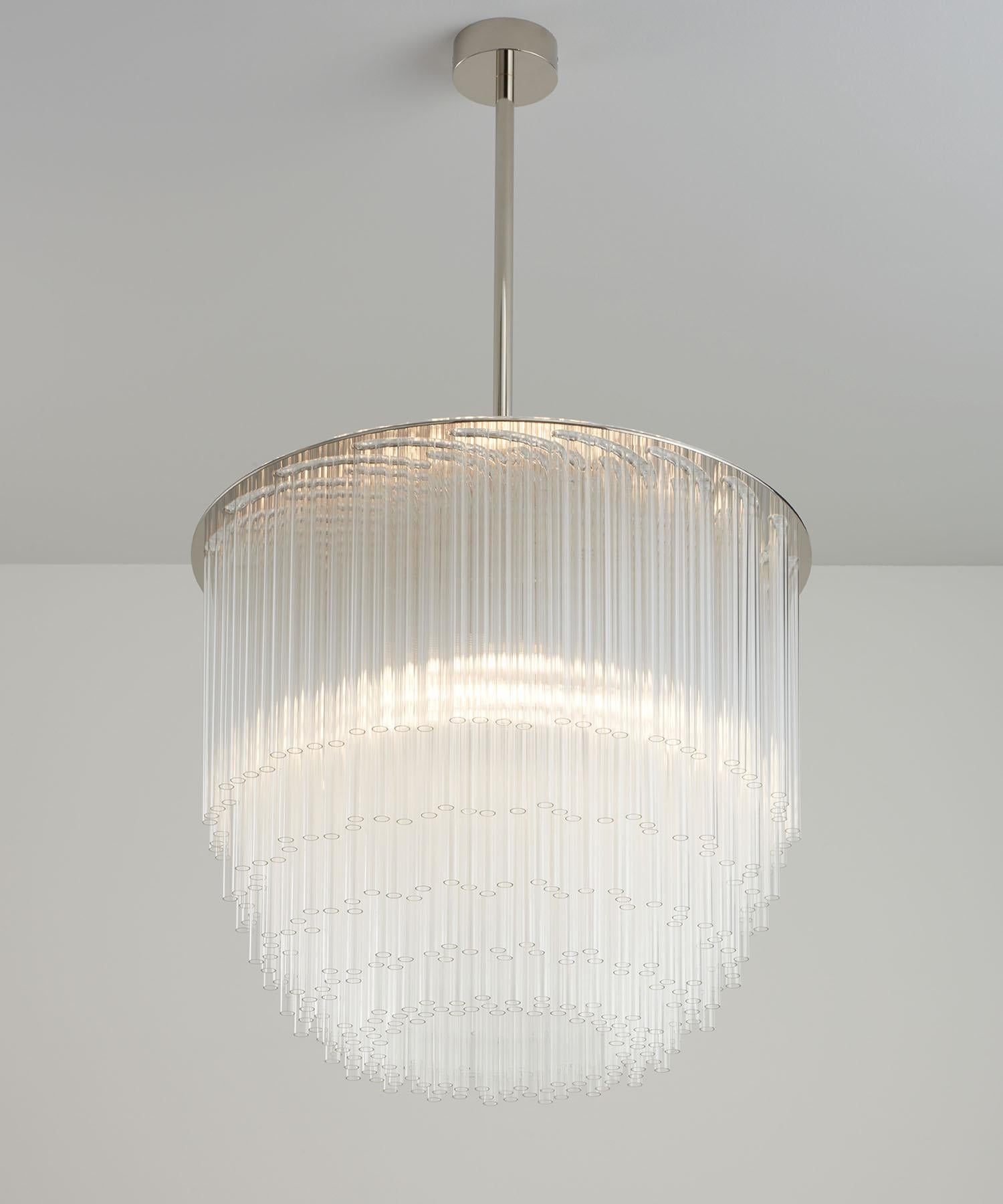A true centrepiece and the perfect focal point for your space, the Disc Chandelier is one of our most popular designs. The clear borosilicate glass comes in a standard configuration and is extremely durable. The light has a made-to-measure stem and