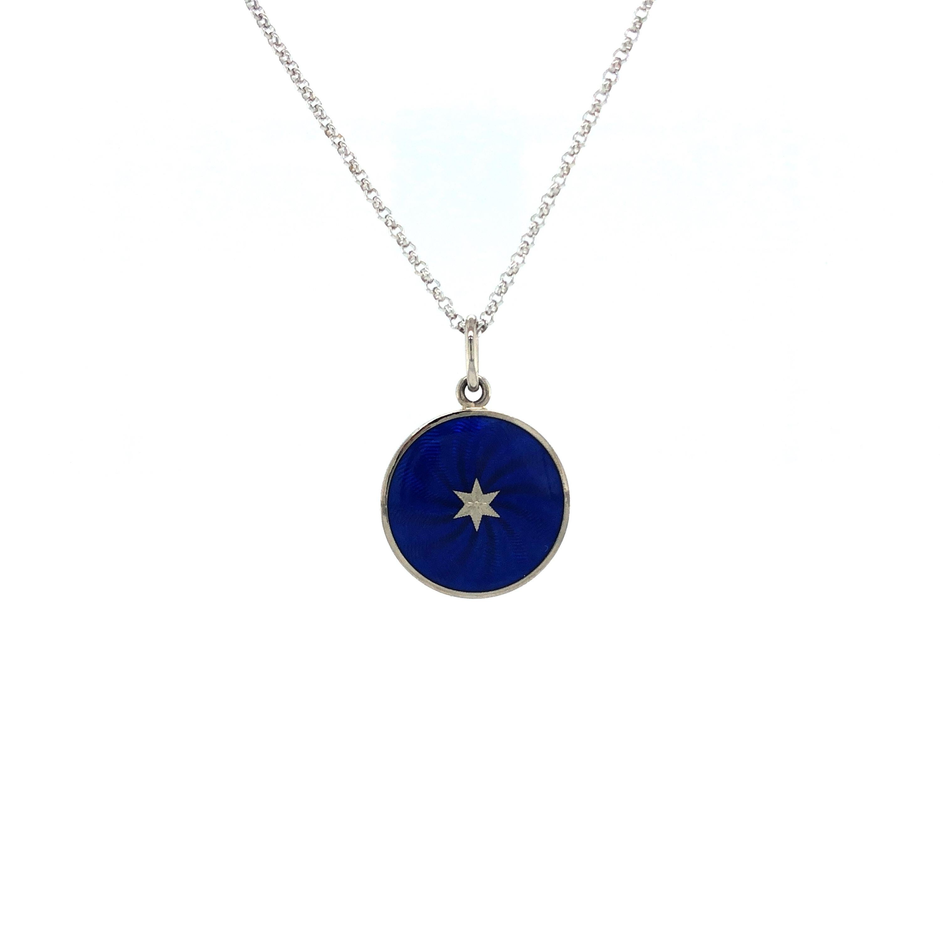 Victor Mayer round disc pendant 18k white gold, Diskos collection, royal blue vitreous, guilloche enamel with star paillon, diameter app. 15 mm

About the creator Victor Mayer
Victor Mayer is internationally renowned for elegant timeless designs and