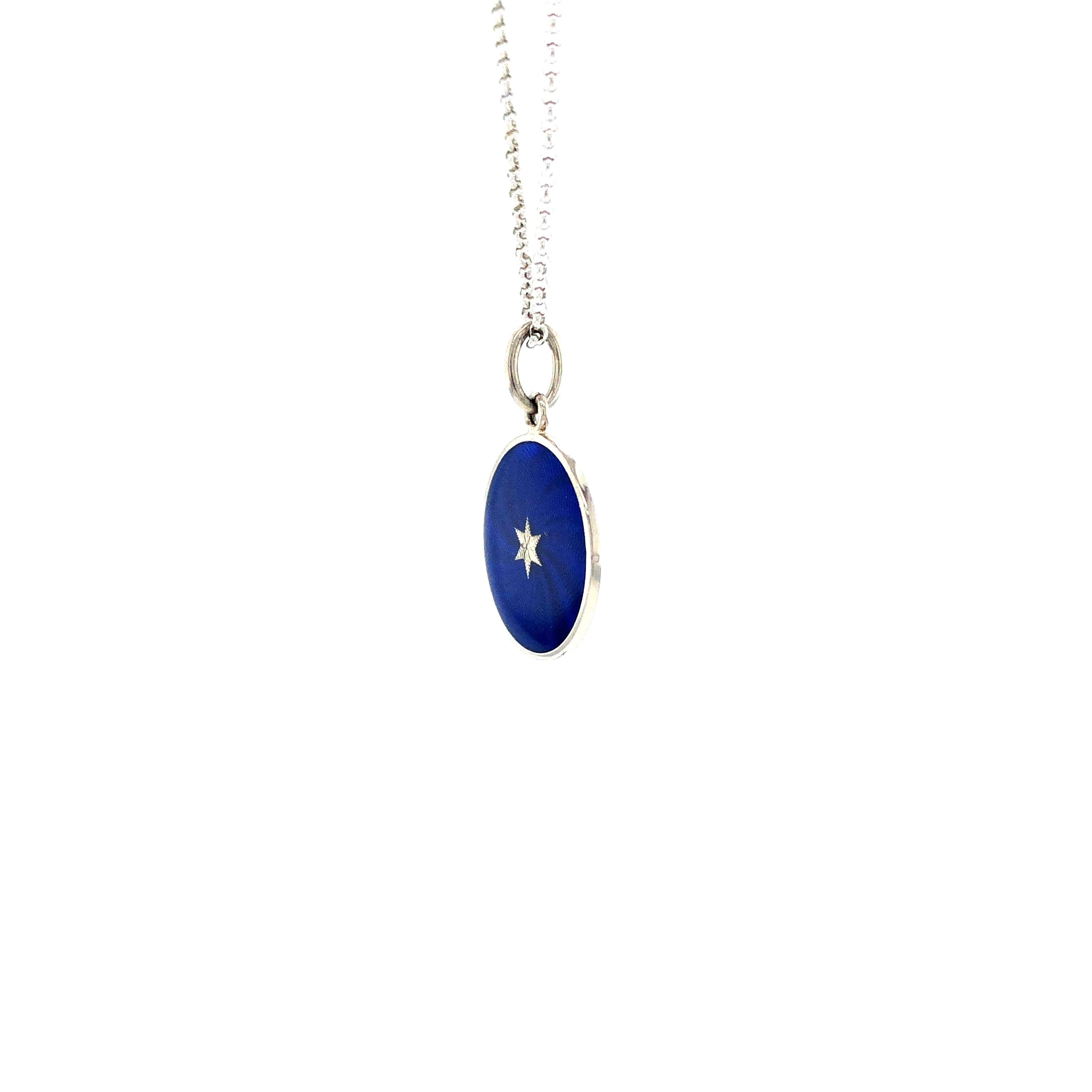 Victor Mayer round disc pendant necklace, 18k white gold, Diskos collection, royal blue vitreous, guilloche enamel with star paillon, diameter app. 15 mm

About the creator Victor Mayer
Victor Mayer is internationally renowned for elegant timeless