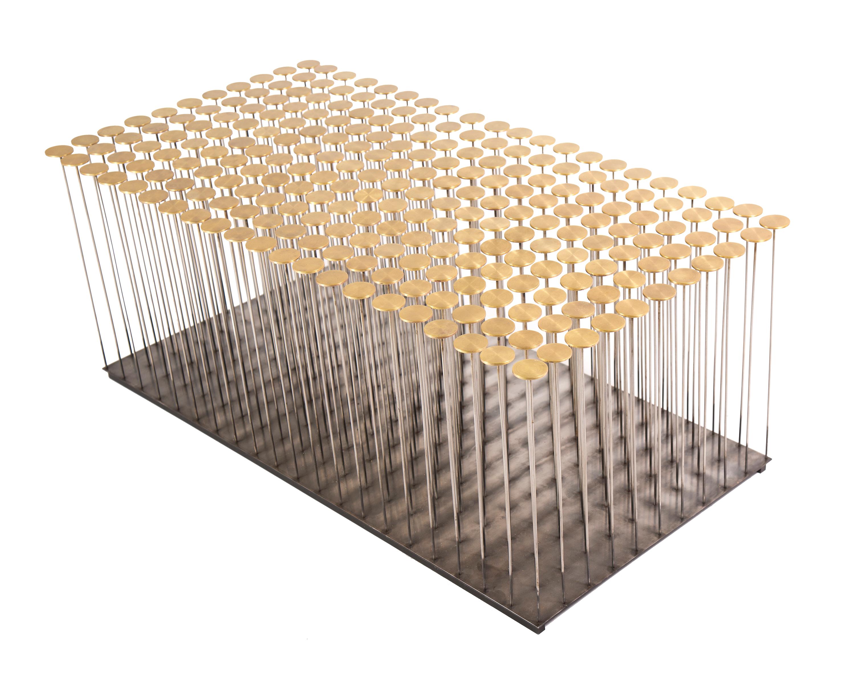 Dischi coffee table by Gentner Design
Dimensions: D 90 x W 45.7 x H 35.5 cm
Materials: brass, darkened stainless steel

With a nod to Harry Bertoia, the Dischi table is both sculptural as it is functional. Amazingly stable as a table surface, this