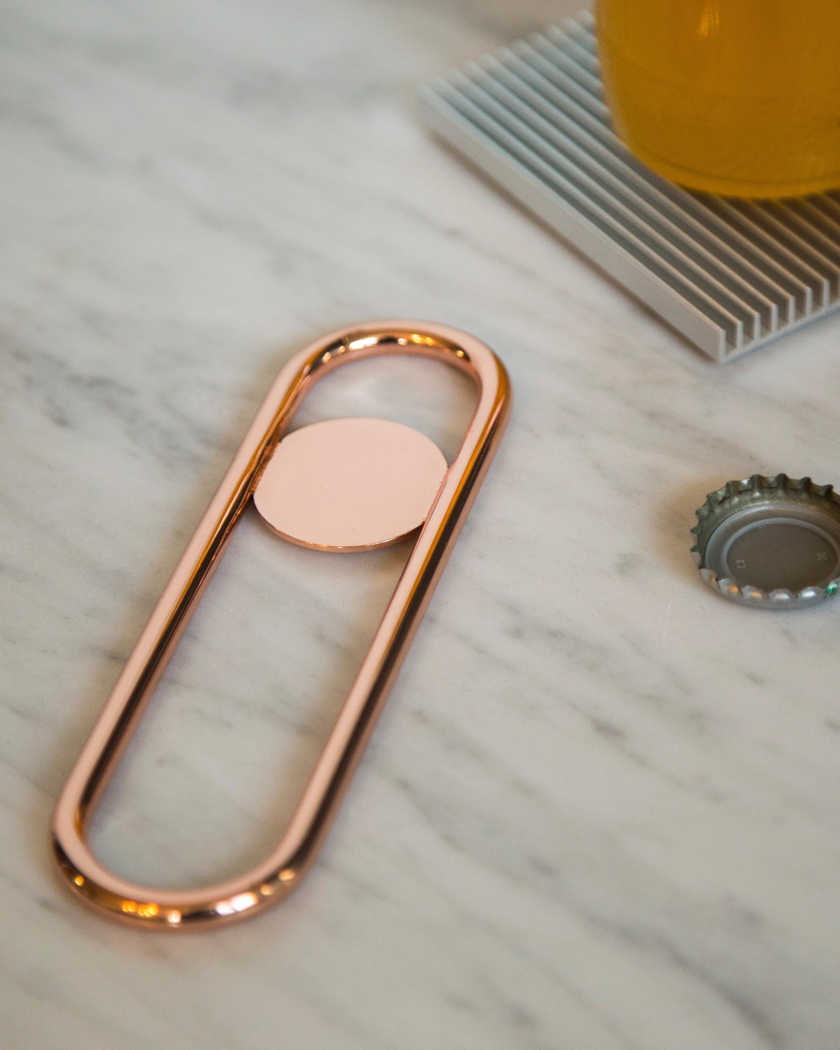 Minimal, geometric, and fit for a space ship, the disco bottle opener is just what you need to get a party started. Available in brass, copper, or chrome.