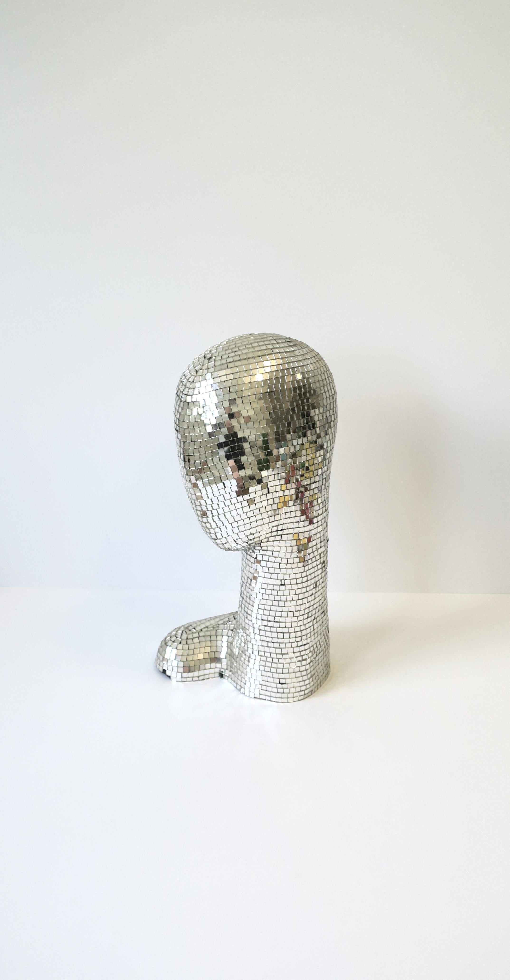 A disco head bust, circa 1970s, New York, NY. This female head bust sculpture is hand-crafted with small glass mirror mosaic pieces just like the 'Disco Ball'. A great piece reminiscent of the disco nightclub era. Dimensions: 8