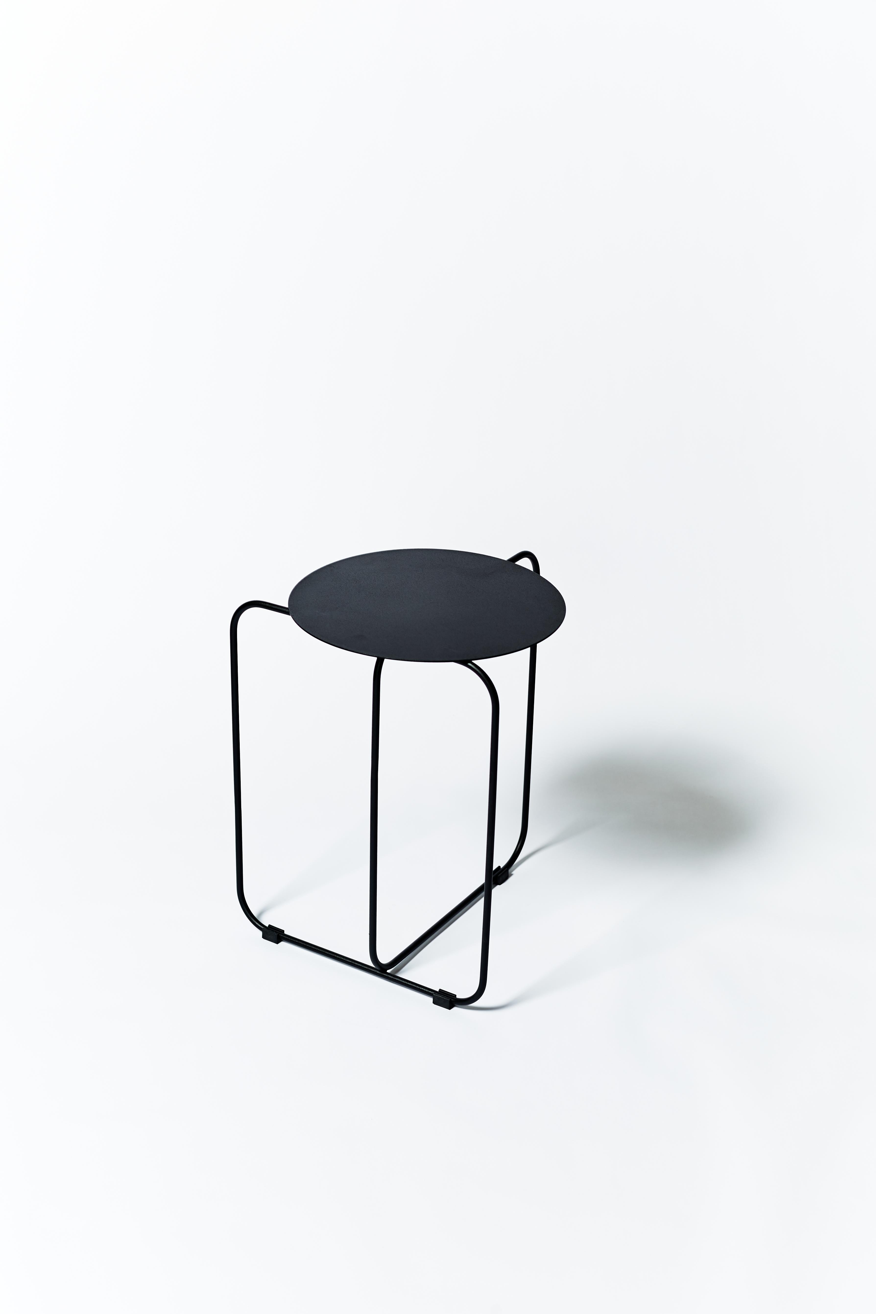 The Disco Sidetable was design to be a elegant yet discret addition to your living room. Made entirely of carbon stell, this piece was made to last and give a fresh felling to the space. Design by Bernardo Senna and made Estudio Few the Disco