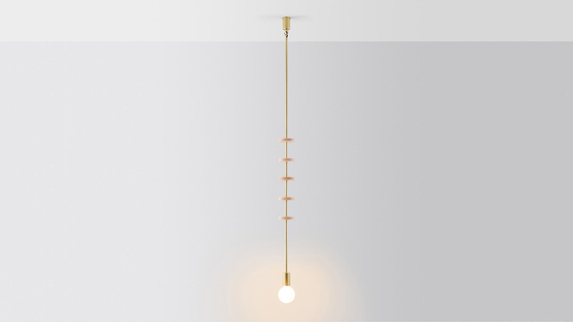 Discus 5 pendant light by Volker Haug
Dimensions: Diameter 9 x H 106 cm 
Material: Brass, marble
Finish: Polished, aged, brushed, bronzed, blackened, or plated
Marble Disc: As specified (shown in pink marble)
Lamp: Opal G95 LED (E26/E27 110 -