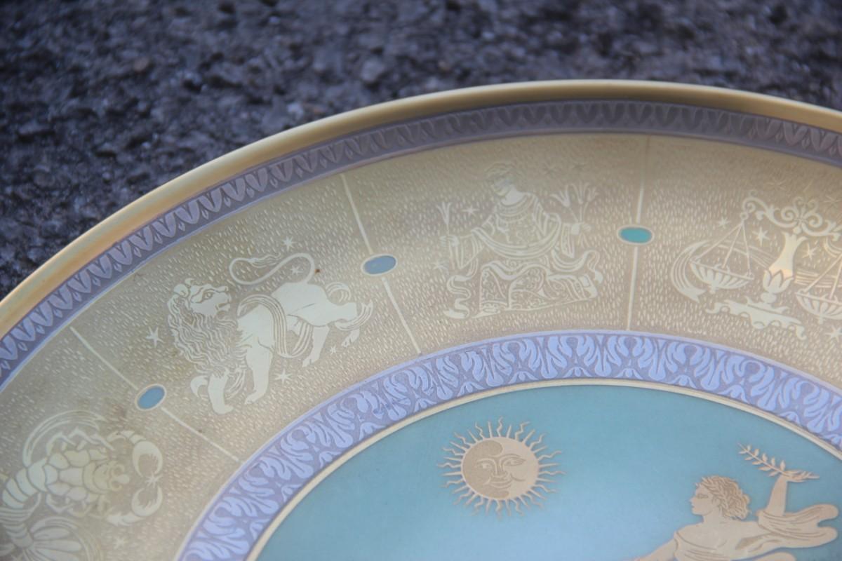 Dish in pure gold porcelain with decorations of Zodiacal signs, 1960, Italy. Arte Morbelli.
Porcelain engraved to etching.