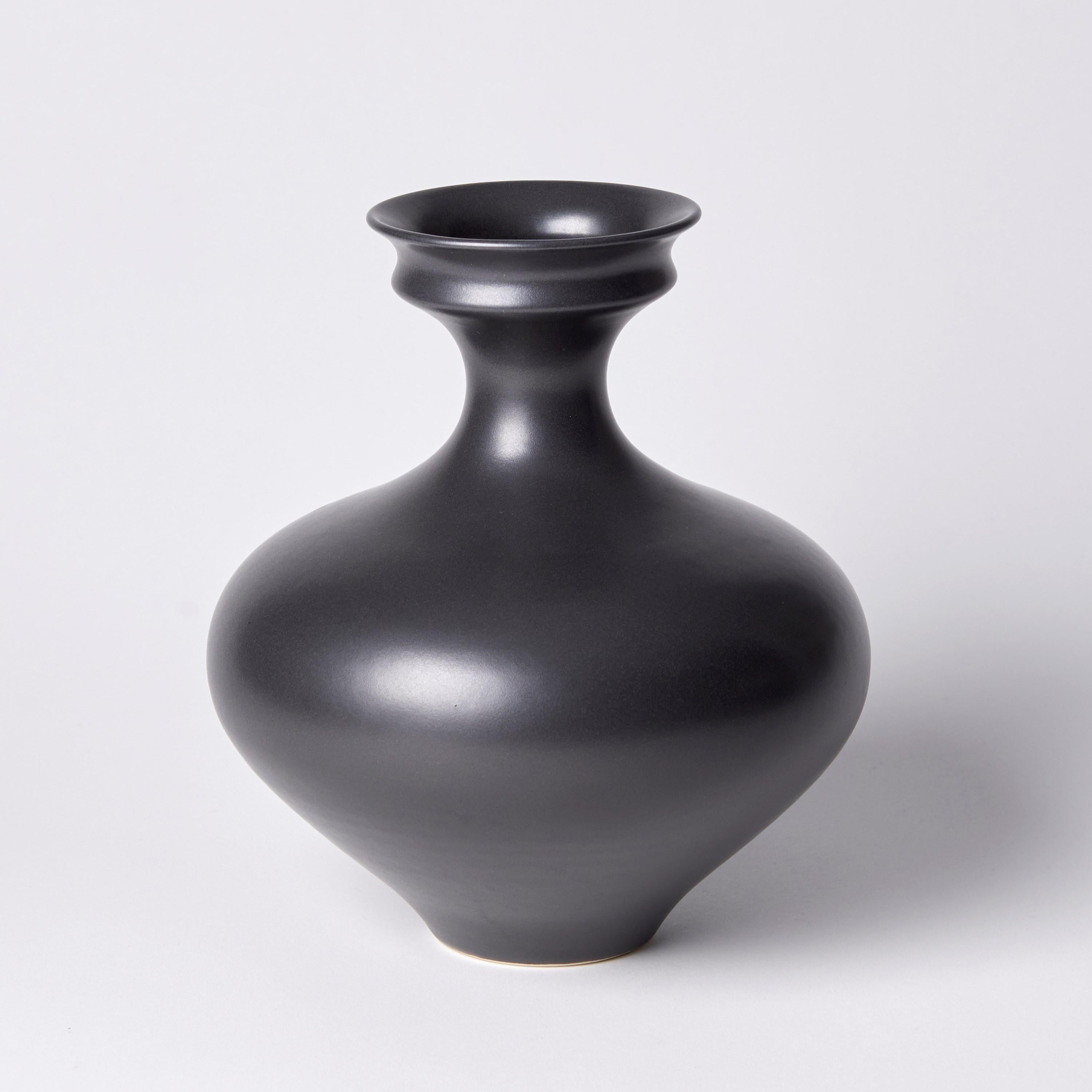 ‘Dish mouth vase I’ is a unique porcelain sculptural vessel by the British artist, Vivienne Foley, which has been released from her own personal archive of artworks. 

Vivienne Foley is based in Gloucestershire where she produces exquisite ceramic