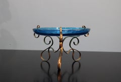 Dish with Blue Glassware and Sculpted Metal