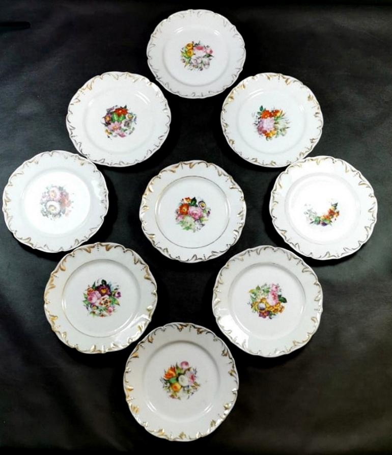 Nine antique French porcelain plates 