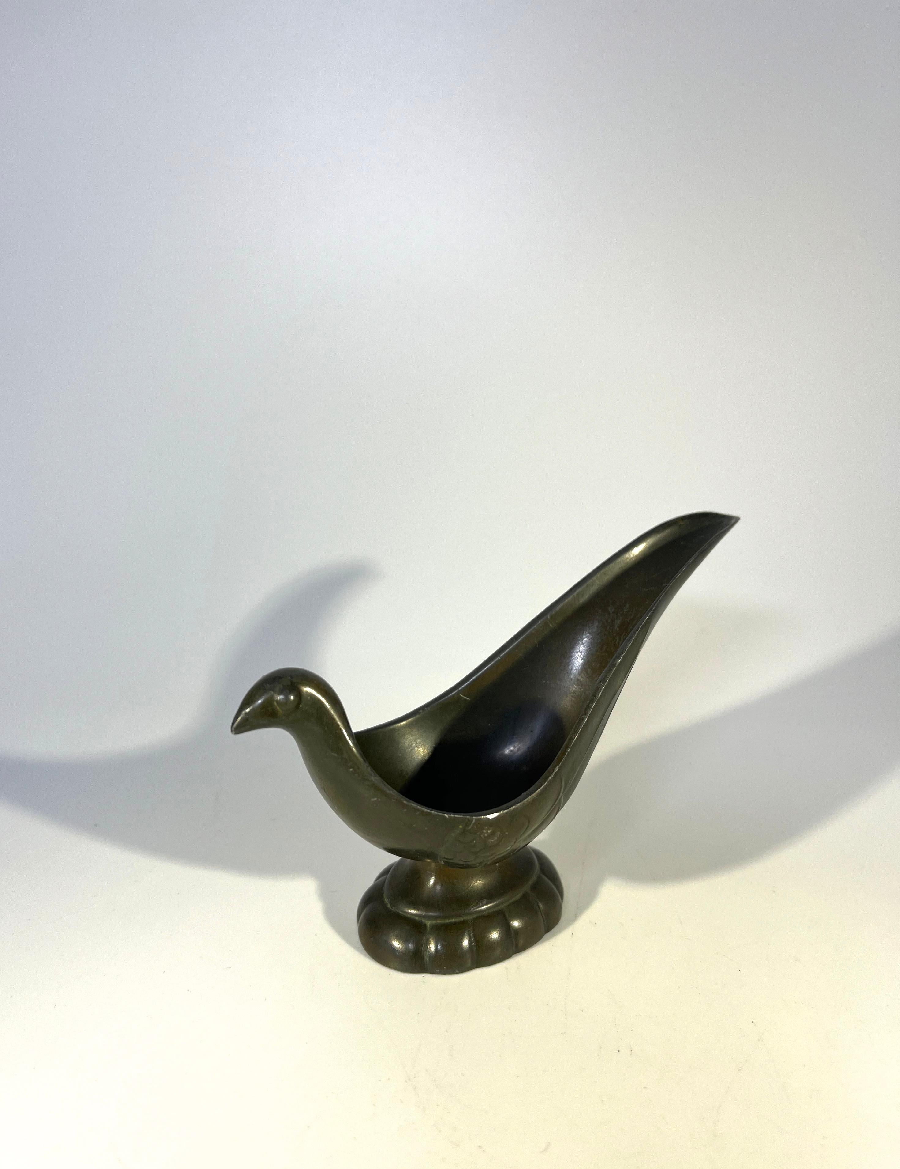 Just Andersen of Denmark, disko metal stylised bird pipe rest
Disko metal, invented by Just Andersen by combing lead and antimony
circa 1930s
Stamped on base
Measures: Height 2.5 inch, width 4.25 inch, depth 1.5 inch
Very good condition and