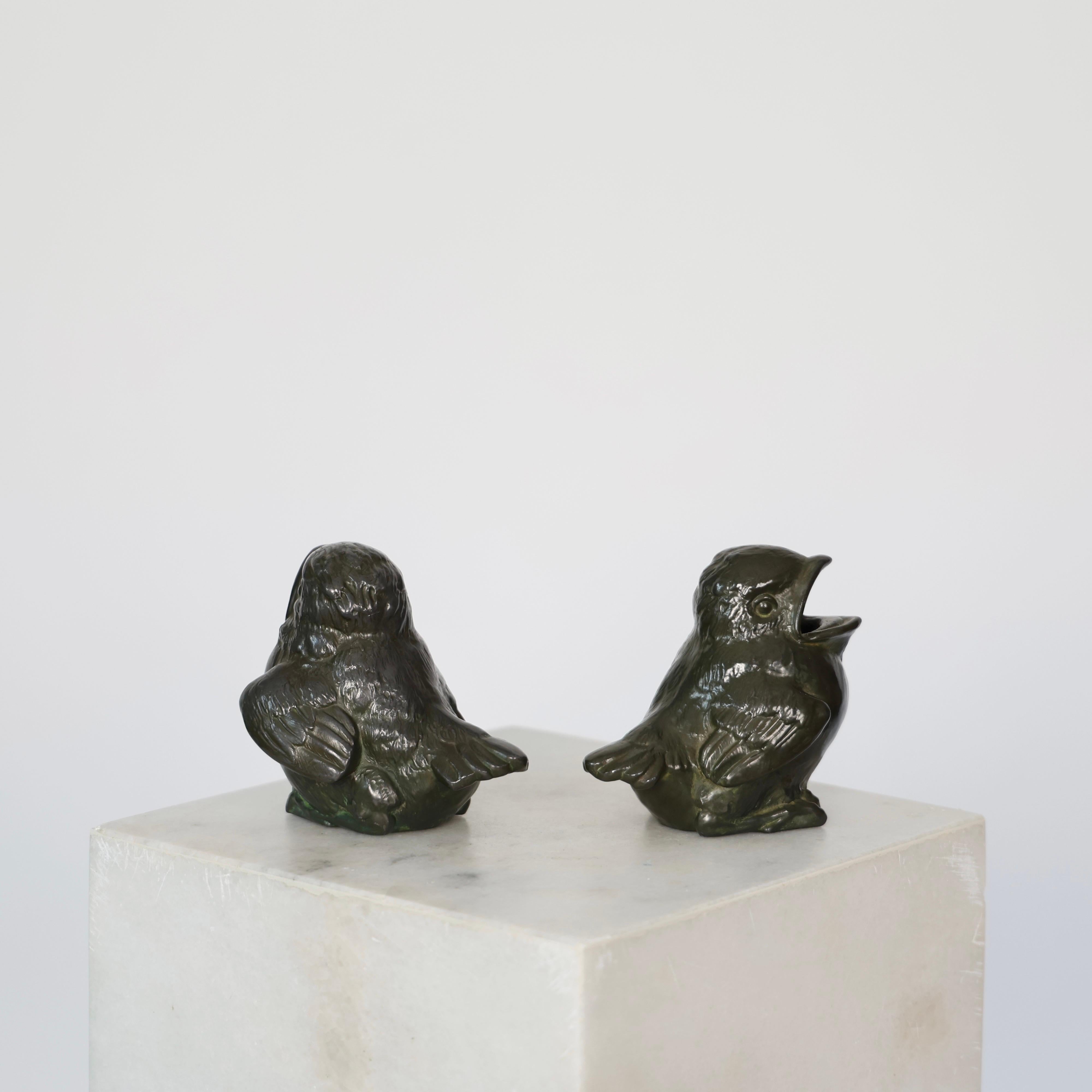 Set of Diskometal Birds made by Just Andersen in the 1930s. 

* Set (2) birds in diskometal
* Designer: Just Andersen
* Model: D2295 (stamped 'Just D2295’)
* Condition: Very good vintage condition. Only very few small marks and scratches. 
* Year: