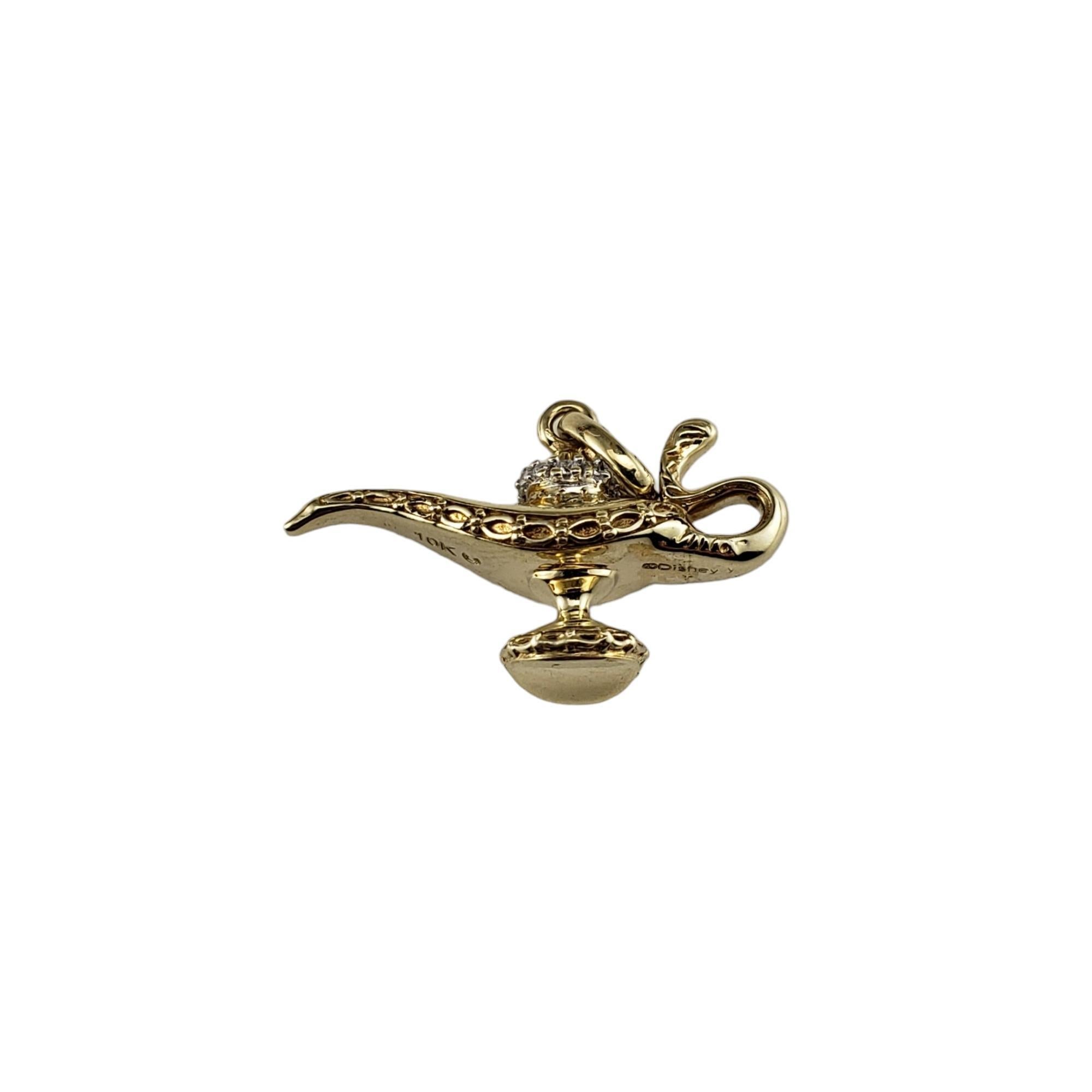 Disney 10K Yellow Gold and Diamond Aladdin Charm-

Capture that Disney magic!

This lovely Aladdin's lamp charm features 14 round brilliant cut diamonds set in beautifully detailed 10K yellow gold.

Approximate total diamond weight: .05 ct.

Diamond