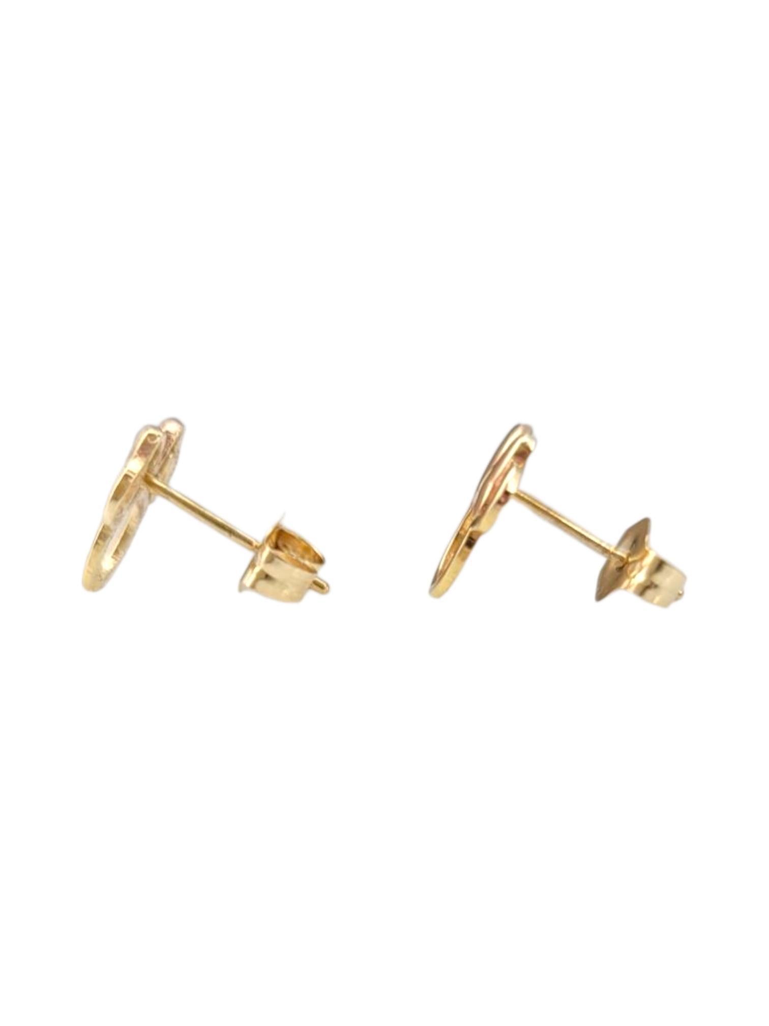 14K Yellow Gold Mini Mouse Earrings -

These Mini Mouse earrings feature a playful, charming design inspired by the beloved Disney character. With their cute, iconic silhouette, they add a fun and whimsical touch to any outfit, making them the