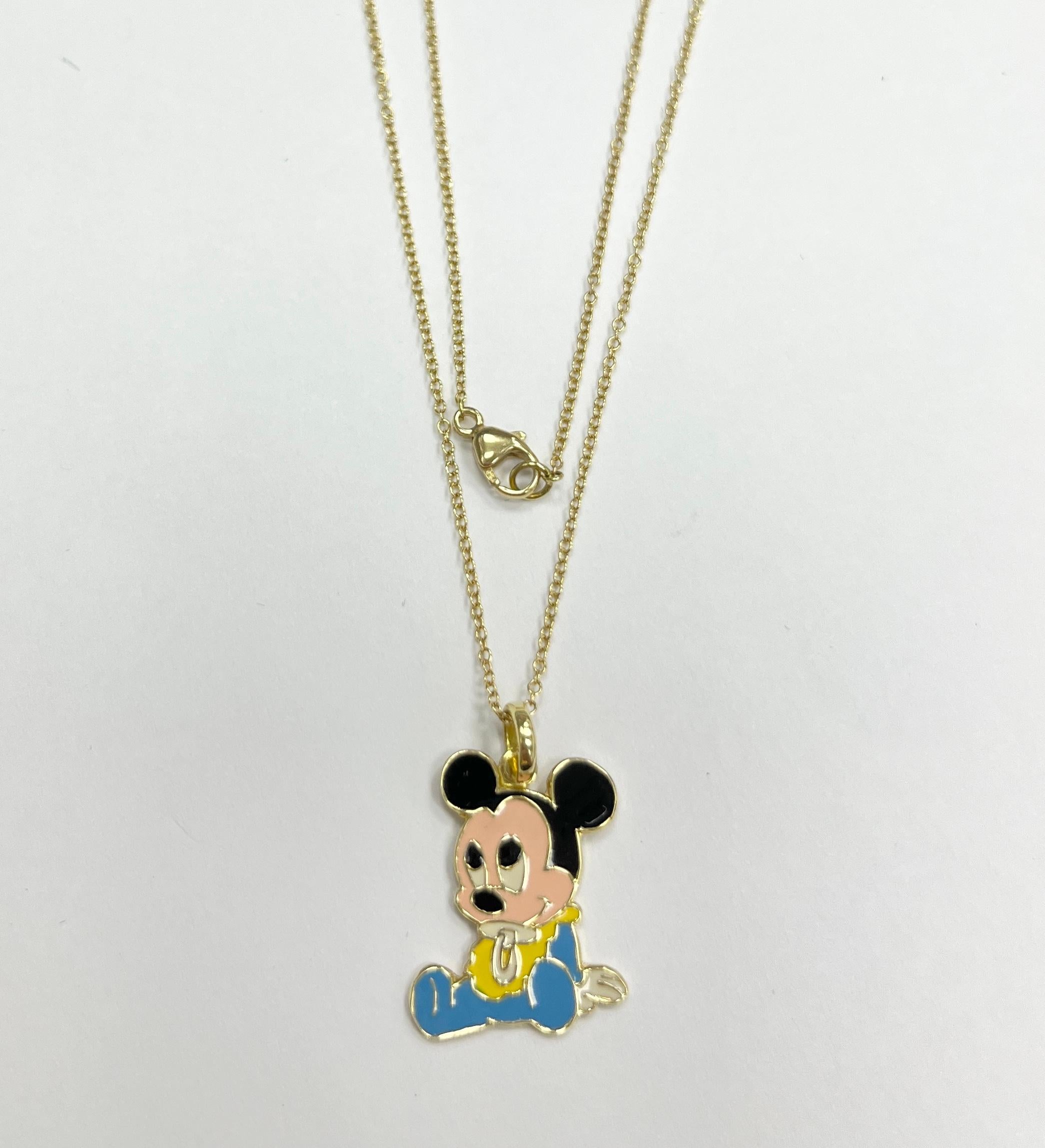 Very rare Disney enamel Mickey Mouse 18K yellow gold charm pendant with 18K yellow gold chain necklace
weight: 4.5g 
Marked: Disney 750 and Italian marked
25 x 16 mm 
Chain 16