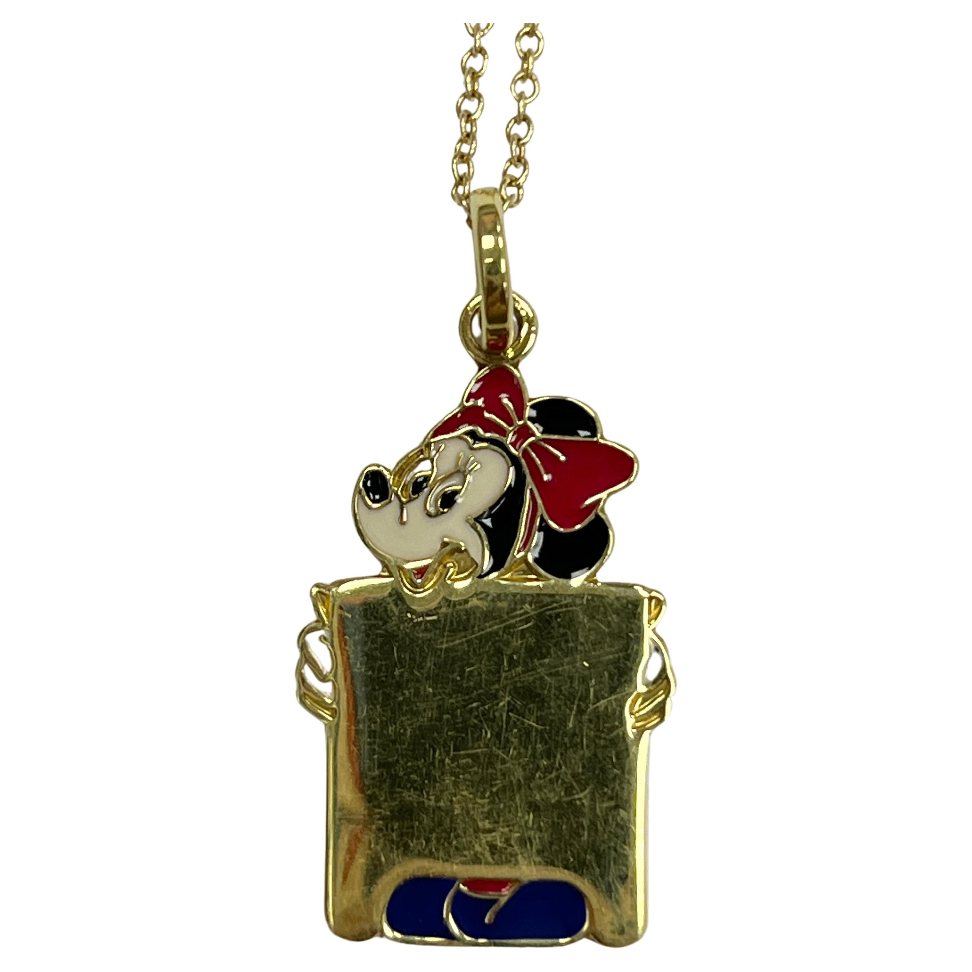 Rare Disney 18K yellow gold Minnie Mouse red black and blue enamel charm pendant with a 18K yellow gold chain necklace
Marked: DISNEY 750 and Italian halkmark
Weight: 4.7 g
Dimension: charm 25 x 14 mm, chain 16