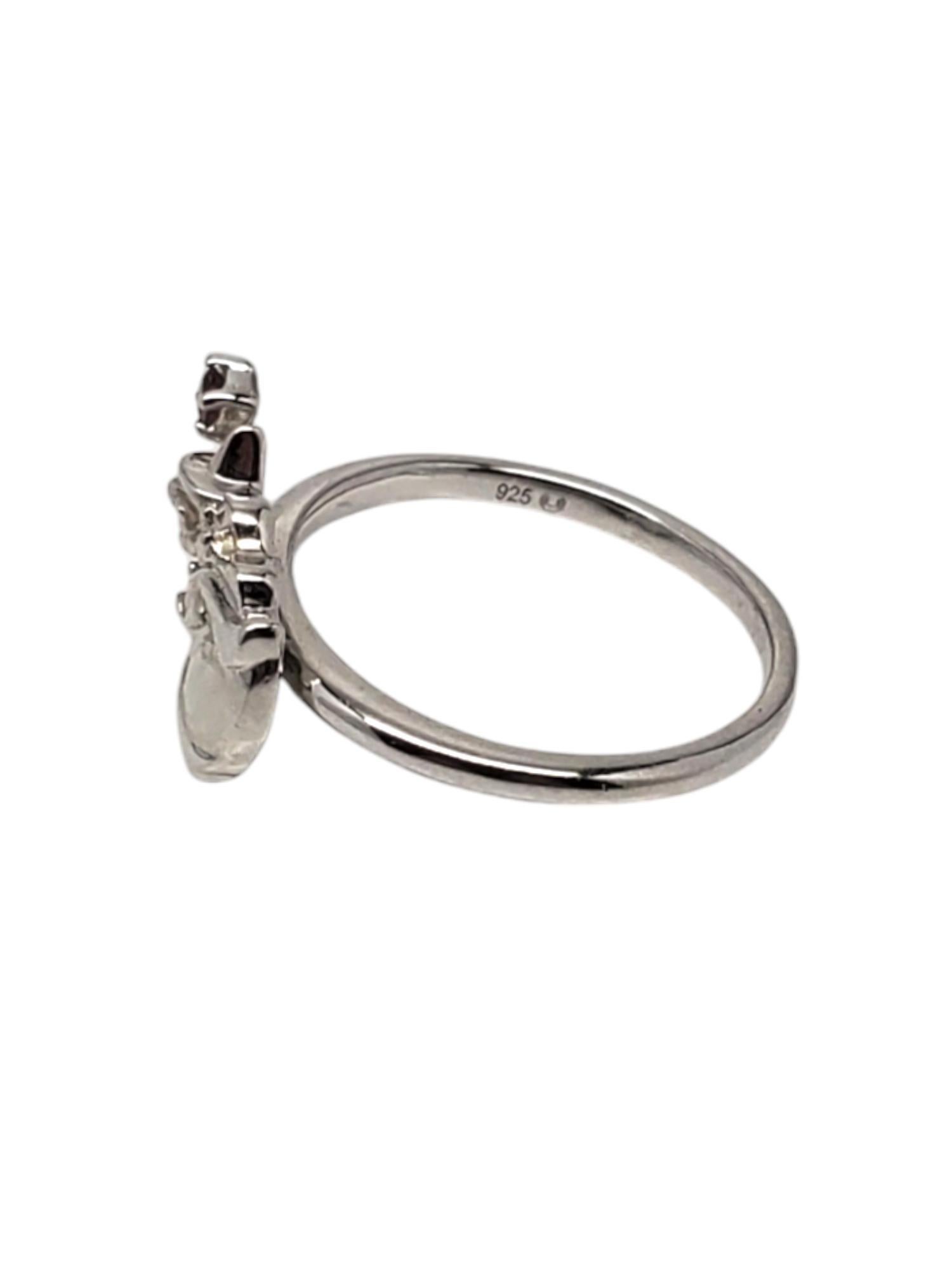 Disney Sterling Silver Pink Tourmaline Cinderella Fairy Godmother Ring -

This whimsical Aurora Flora ring by Disney features a fairy godmother with a pink tourmaline gemstone set in classic sterling silver.

Shank: 1.65 mm

Size: 7

Stamped: DISNEY