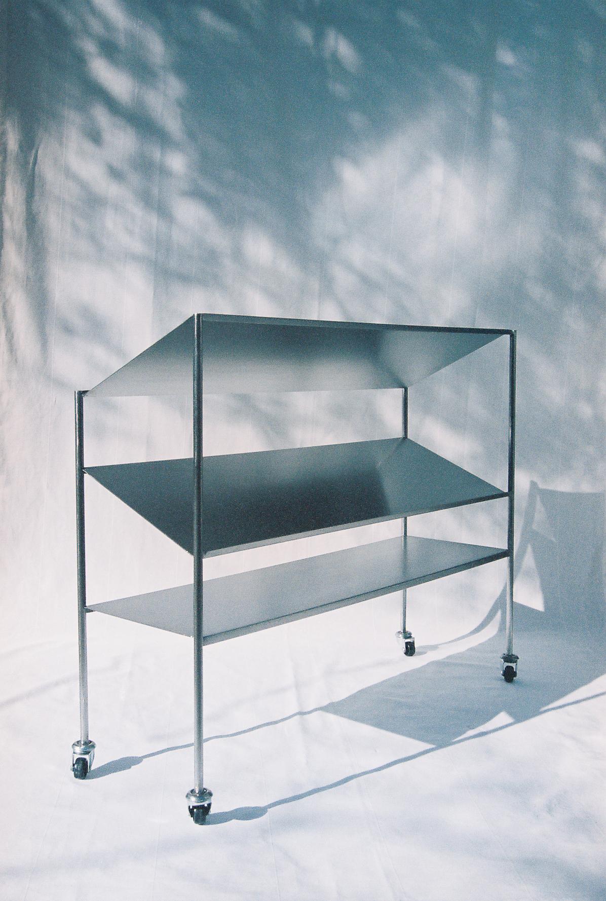 Display 1 Moving Shelves by Georgiev Zabeta
Dimensions: D 25 x W 60 x H 80 cm.
Materials: Brushed stainless steel.

Georgiev Zabeta is a multidisciplinary practice that floats within architecture, art, theory, research, and other phenomena.

We