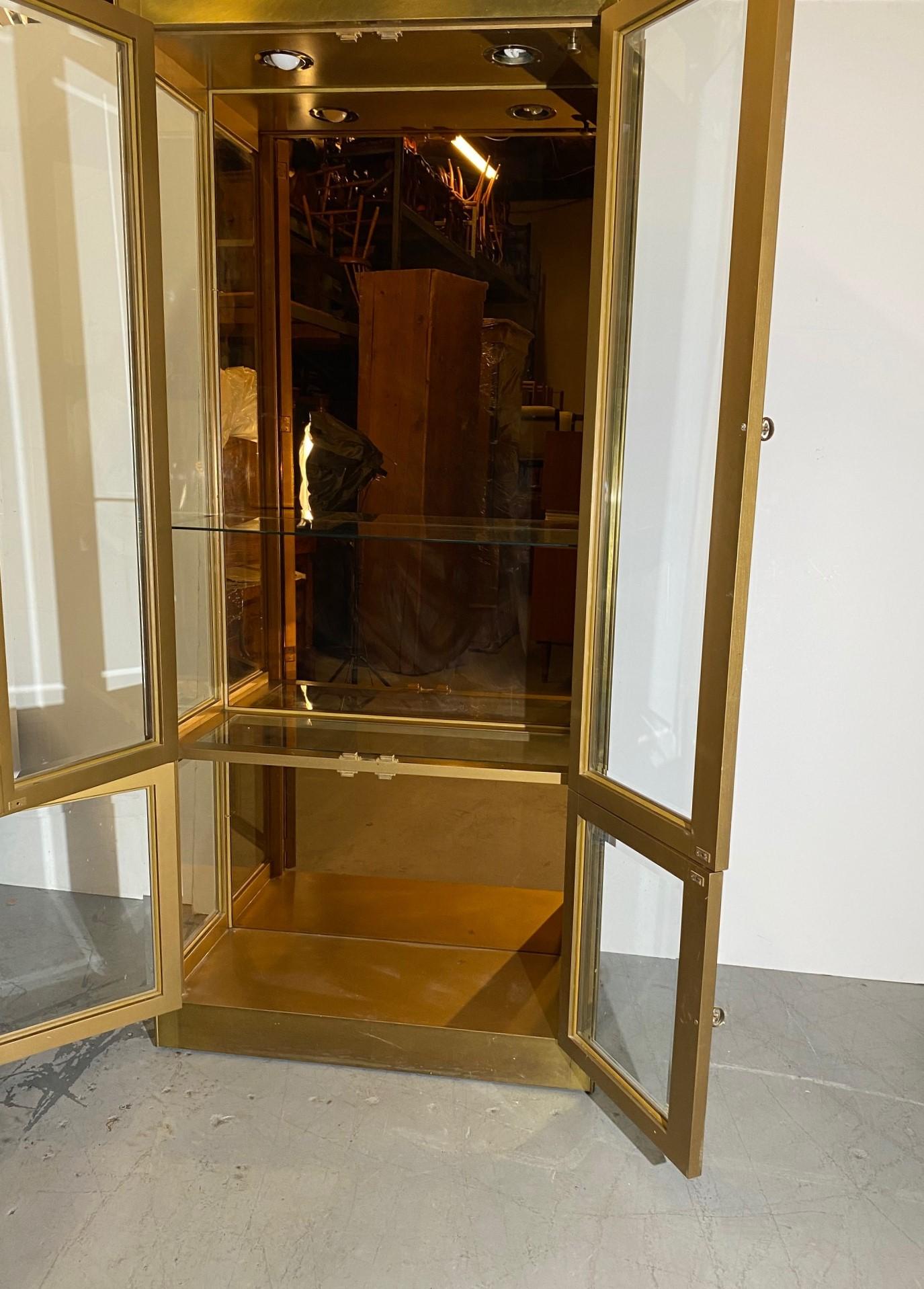 Mid-Century Modern brass display cabinet by Mastercraft.