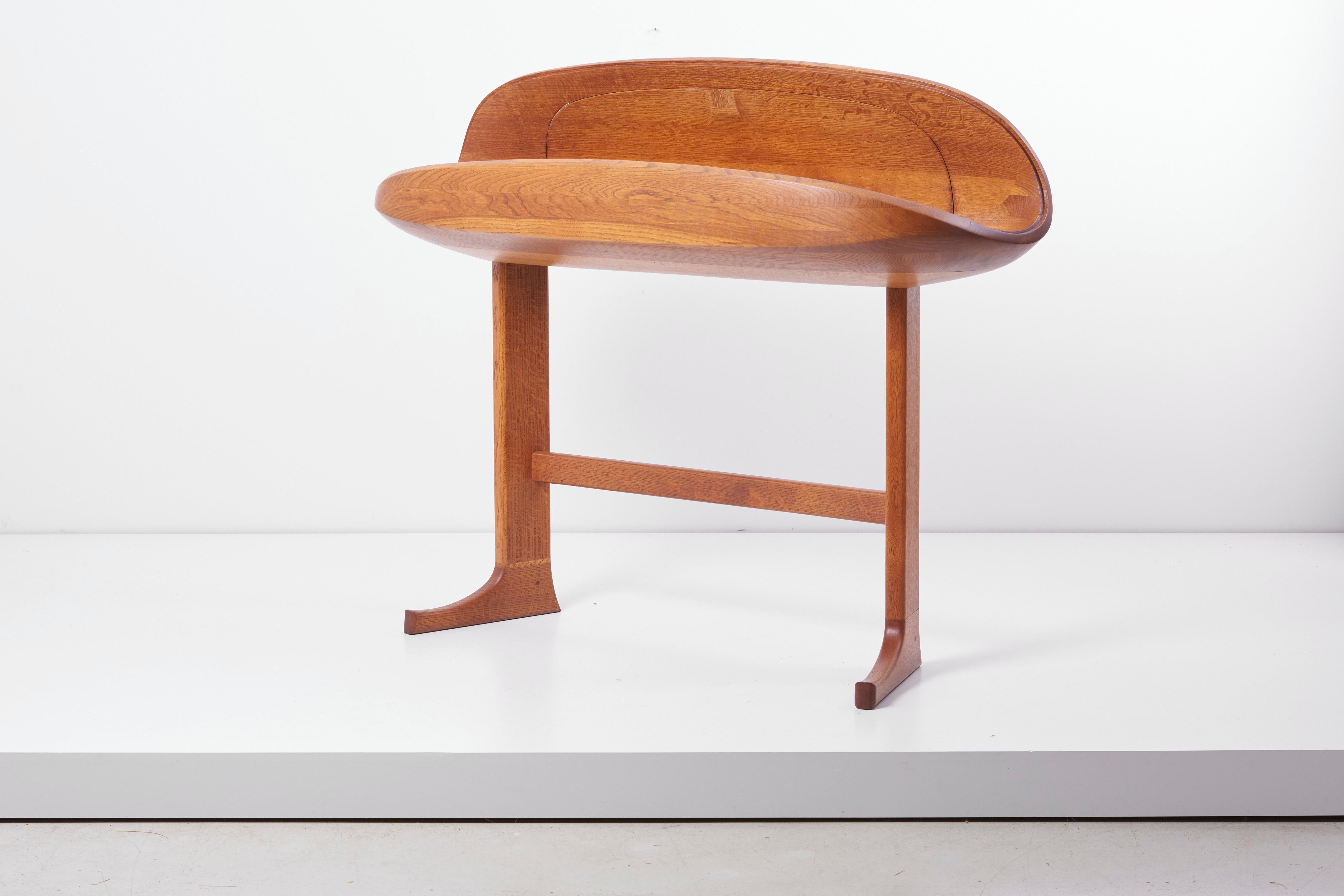 Unique sculptural display case in oak from 1965 by craftsmen Donald Lloyd Mckinley (signed). Glass dome is missing (needs a rear window from a 1954s Plymouth).
