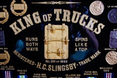 Display of Medals from H.C. Slingsby Truck Company, Set in Large Oval Frame