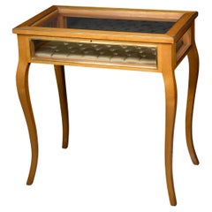 Vintage Display table in lemon-coloured wood.