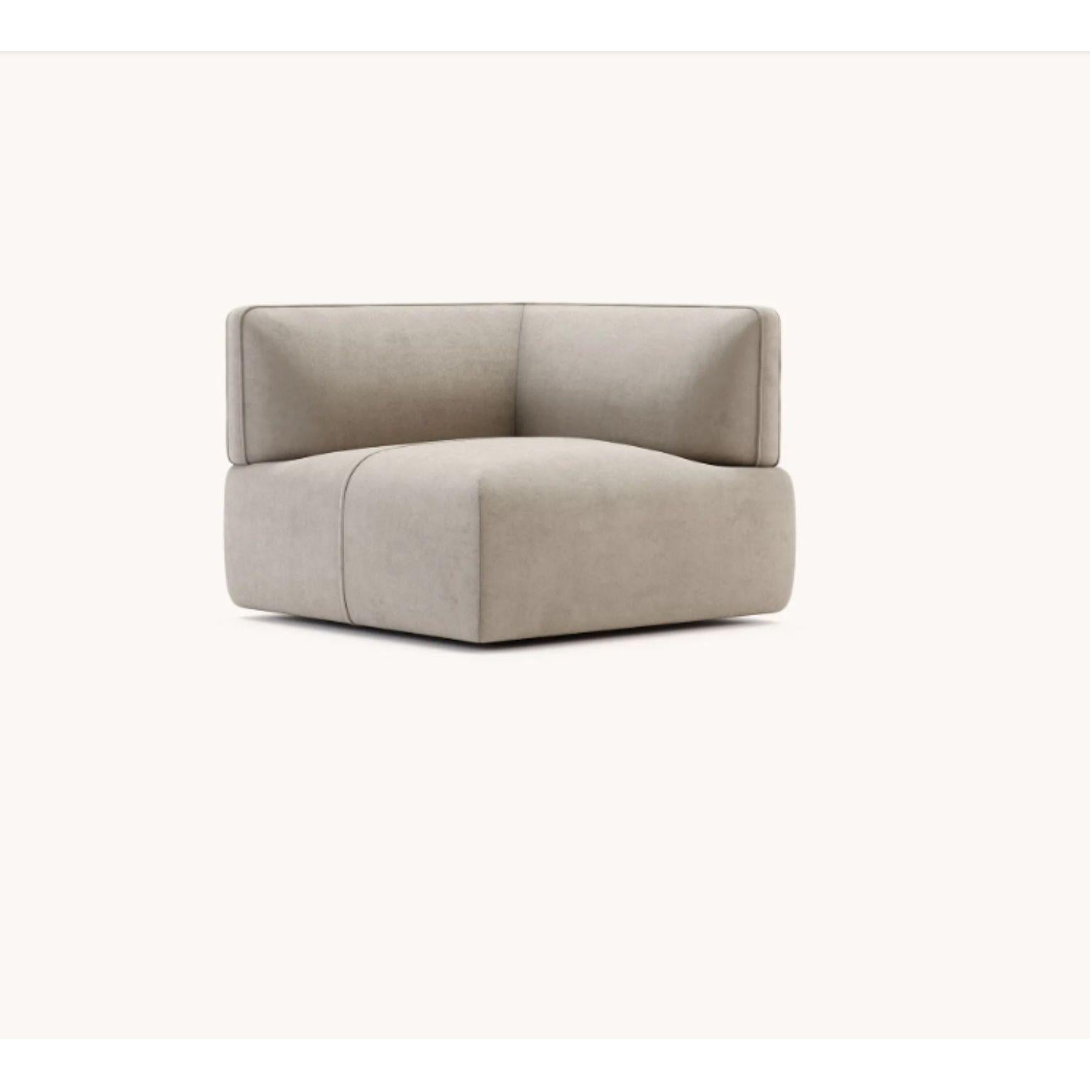 Disruption Module Corner by Domkapa
Materials: Velvet (Aldan 2928). 
Dimensions: W 100 x D 100 x H 80 cm.
Also available in different materials. Please contact us.

Disruption is a modular sofa, fully upholstered, with minimalistic design and