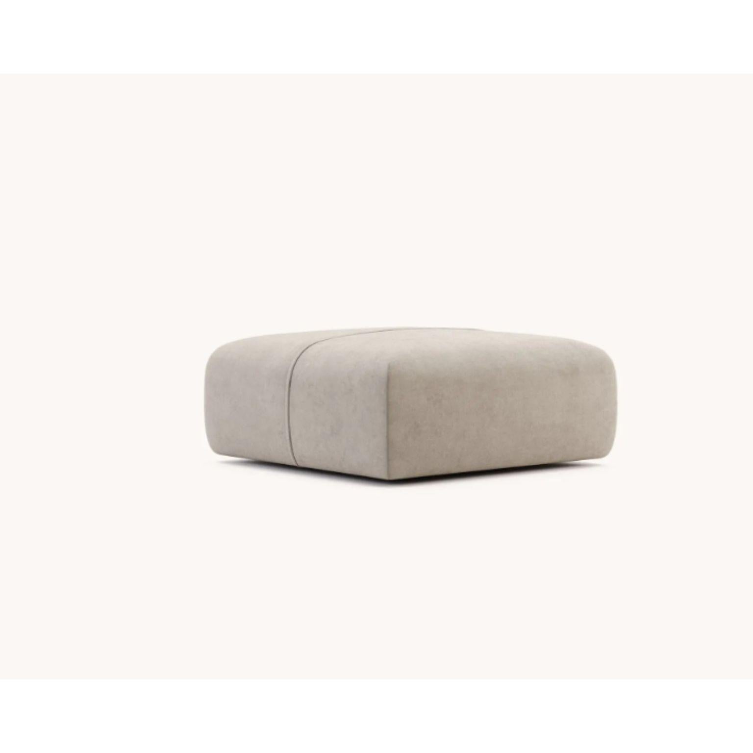 Disruption module pouf by Domkapa
Materials: velvet (Aldan 2928). 
Dimensions: W 100 x D 100 x H 40 cm.
Also available in different materials. 

Disruption is a modular sofa, fully upholstered, with minimalistic design and ergonomic