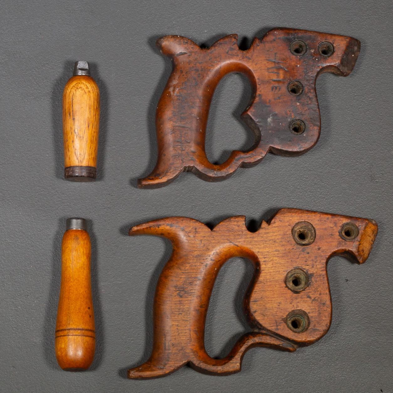 ABOUT

A pair of carved saw handles and two carpenter tool handles. 

    CREATOR Disston & Son. 
    DATE OF MANUFACTURE c.1930. 
    MATERIALS AND TECHNIQUES Apple Wood, Steel. 
    CONDITION Good. Wear consistent with age and use. Missing brass