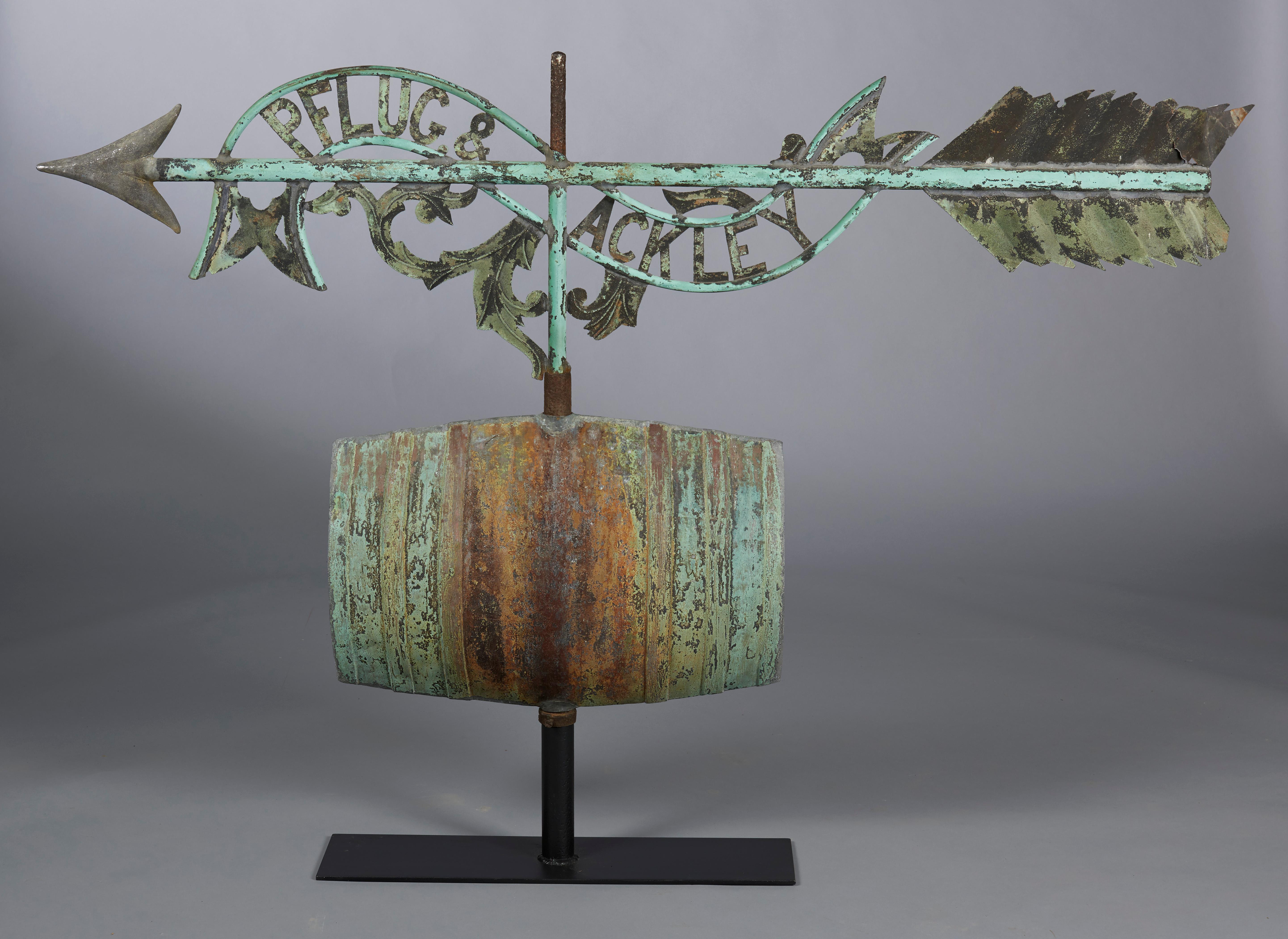 Pflug and Ackley’s Beverage Company was founded by Henry E. Ackley and Daniel Plug in 1880 as a drink manufacturer and bottler.
This weathervane stood on top the Phlug and Ackley bottling department and sales rooms in Hempstead, Long Island and is