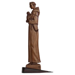 Scultura di un uomo religioso scolpita a mano in stile Art Carved
