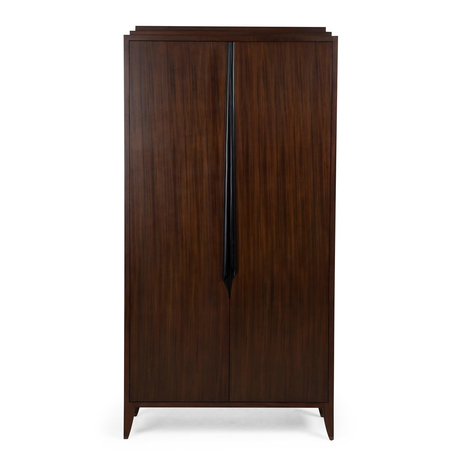 Cabinet distinct large with all structure made in
solid mahogany wood. With one hanging rail and two
top drawers and with one down central drawer. With
two hand-carved wood handles.

 