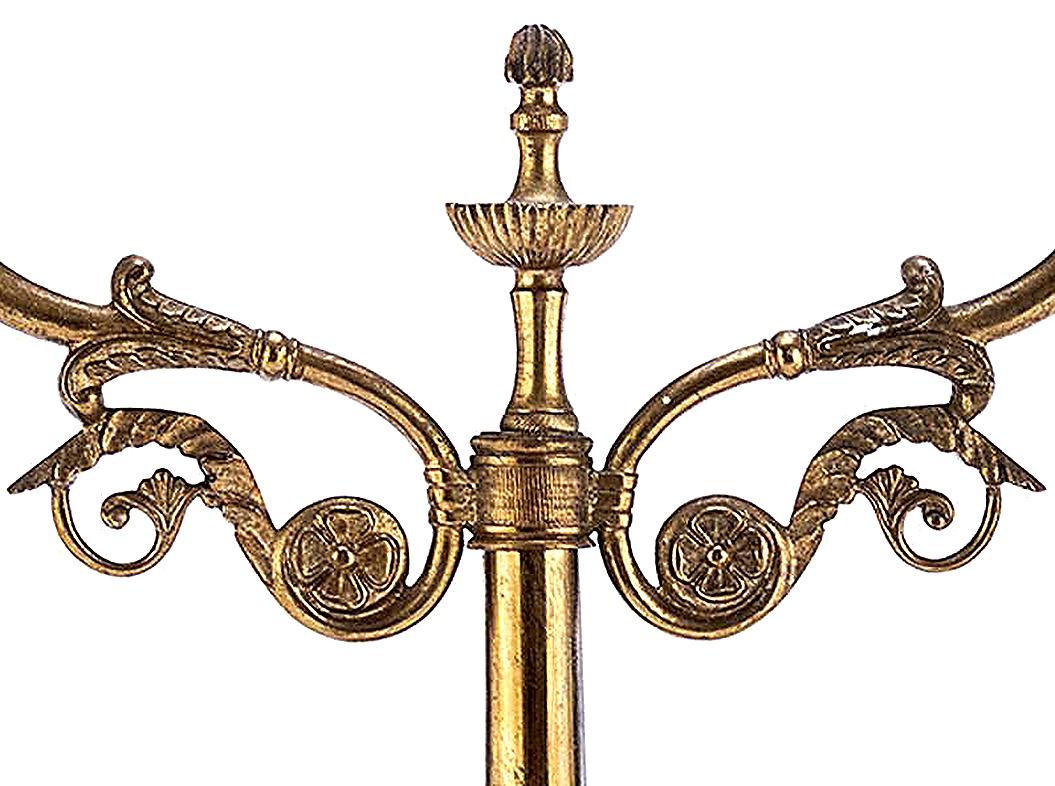 Anonymous
19th century; European
Gilt bronze and metal

Approximate size: 17.75 (h) x 9.75 (w) x 3.5 (d) inches

The present pair of distinctive antique gilt metal candlesticks are inspired by the en vogue neo-classicism of 19th century Europe.