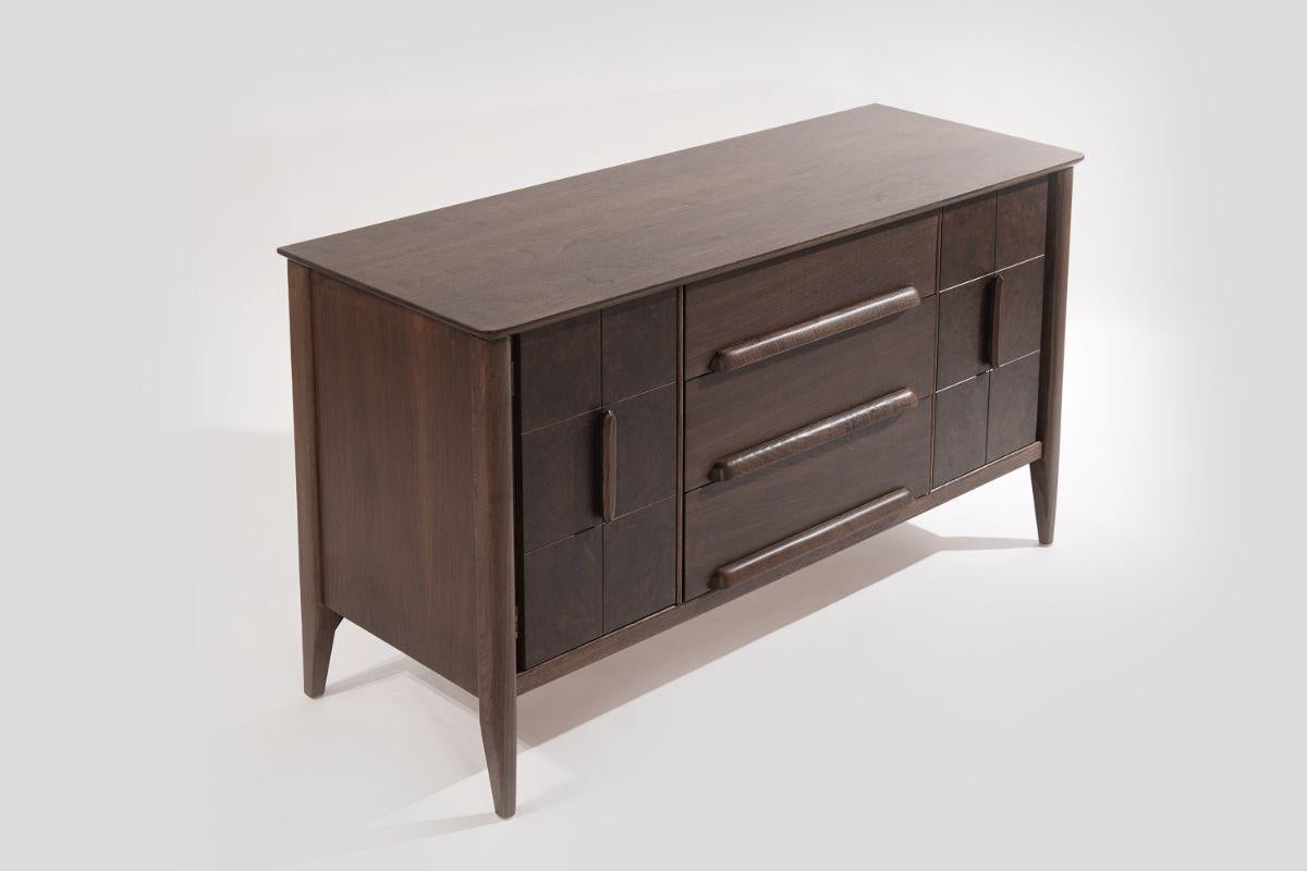 A petite Mid-Century Modern credenza by Stanley Furniture, featuring walnut burl doors showcasing gorgeous grain, the three-center drawers provide ample storage space for plates and silverware. Completely restored.

Other designers from this era