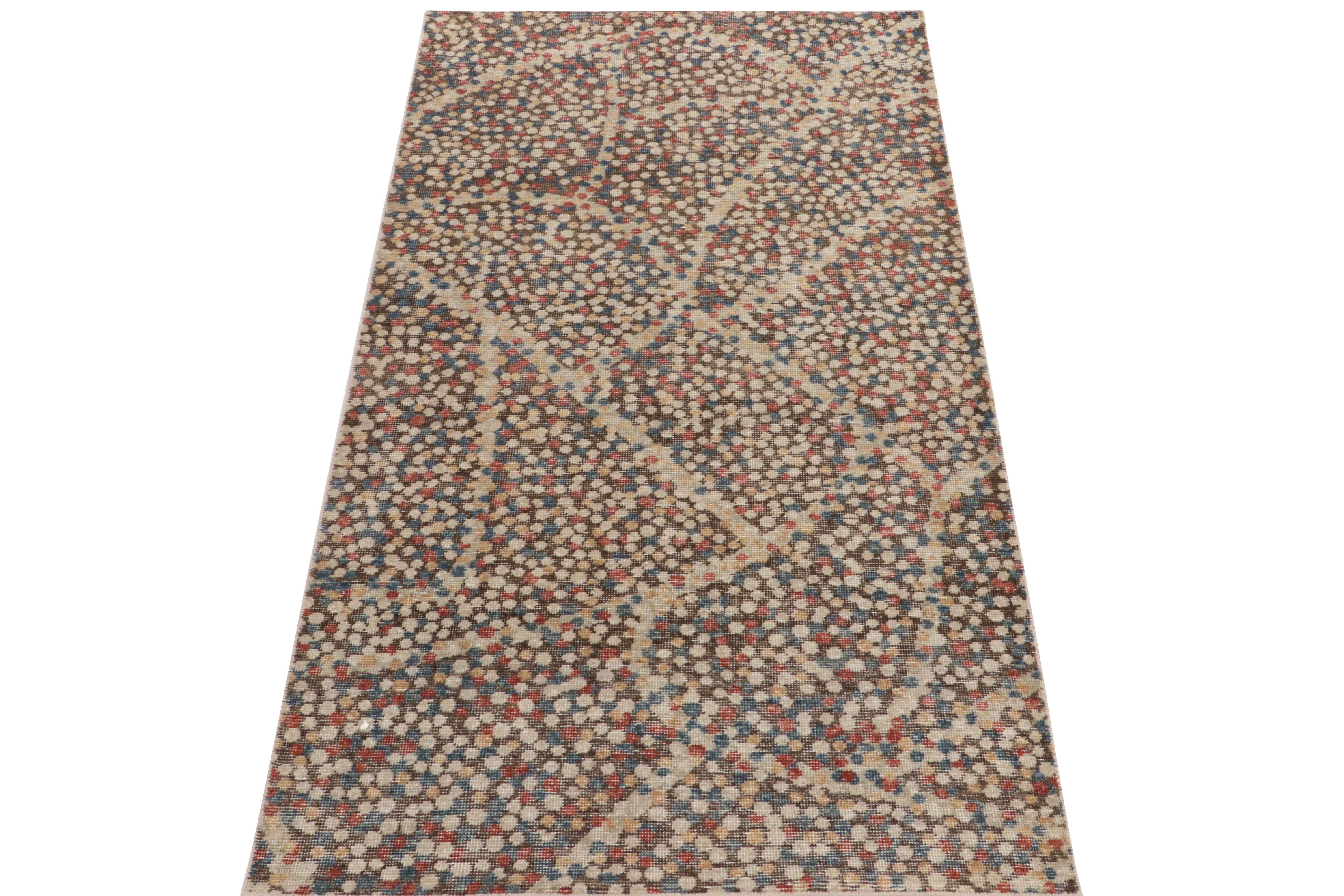 From the Homage Collection by Rug & Kilim’s, a 4 x 8 modern take on distressed style marrying abstract inspiration with a shabby-chic texture. The vision enjoys hues of red, deep blue & beige to off-white dots on a chocolate brown backdrop for a