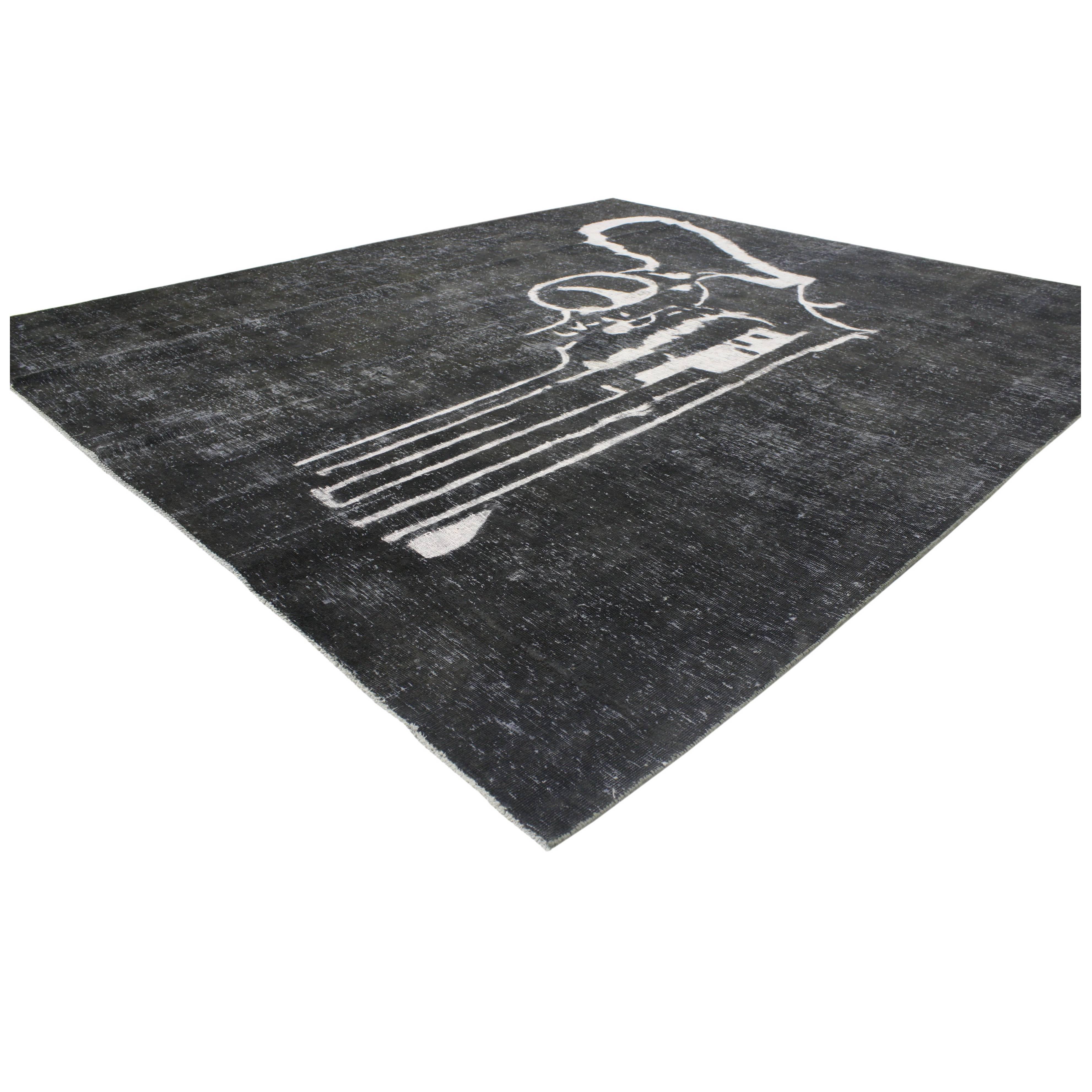 80386 2nd Amendment Vintage Overdyed Rug. Showcasing an esoteric design and artful craftsmanship, this vintage overdyed rug has been given a twist. The controversial pistol pattern and atmospheric colorway woven into this piece work together