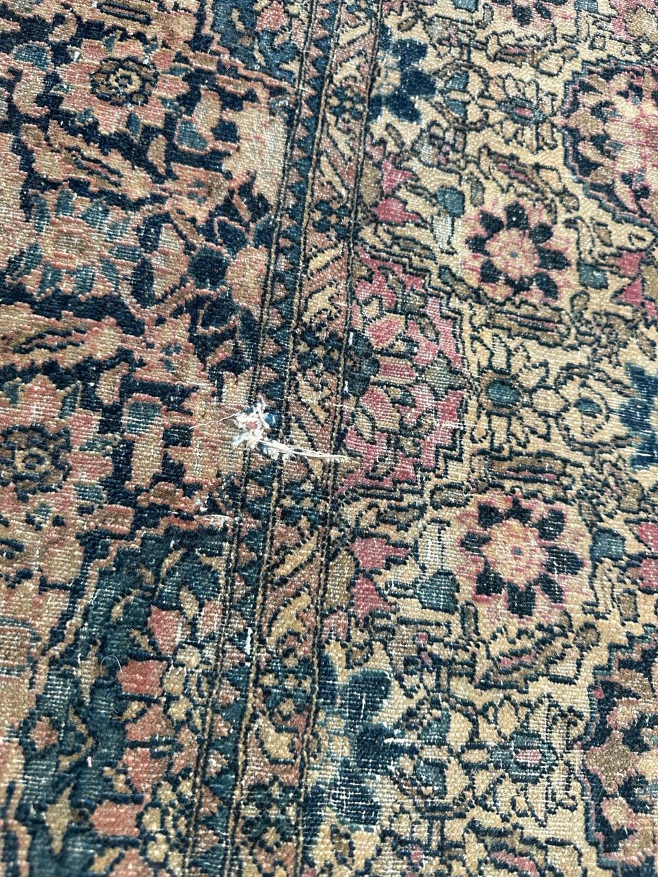 Distressed antique 19th century Isfahan rug For Sale 7
