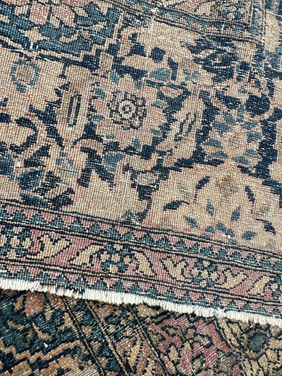 Distressed antique 19th century Isfahan rug For Sale 12